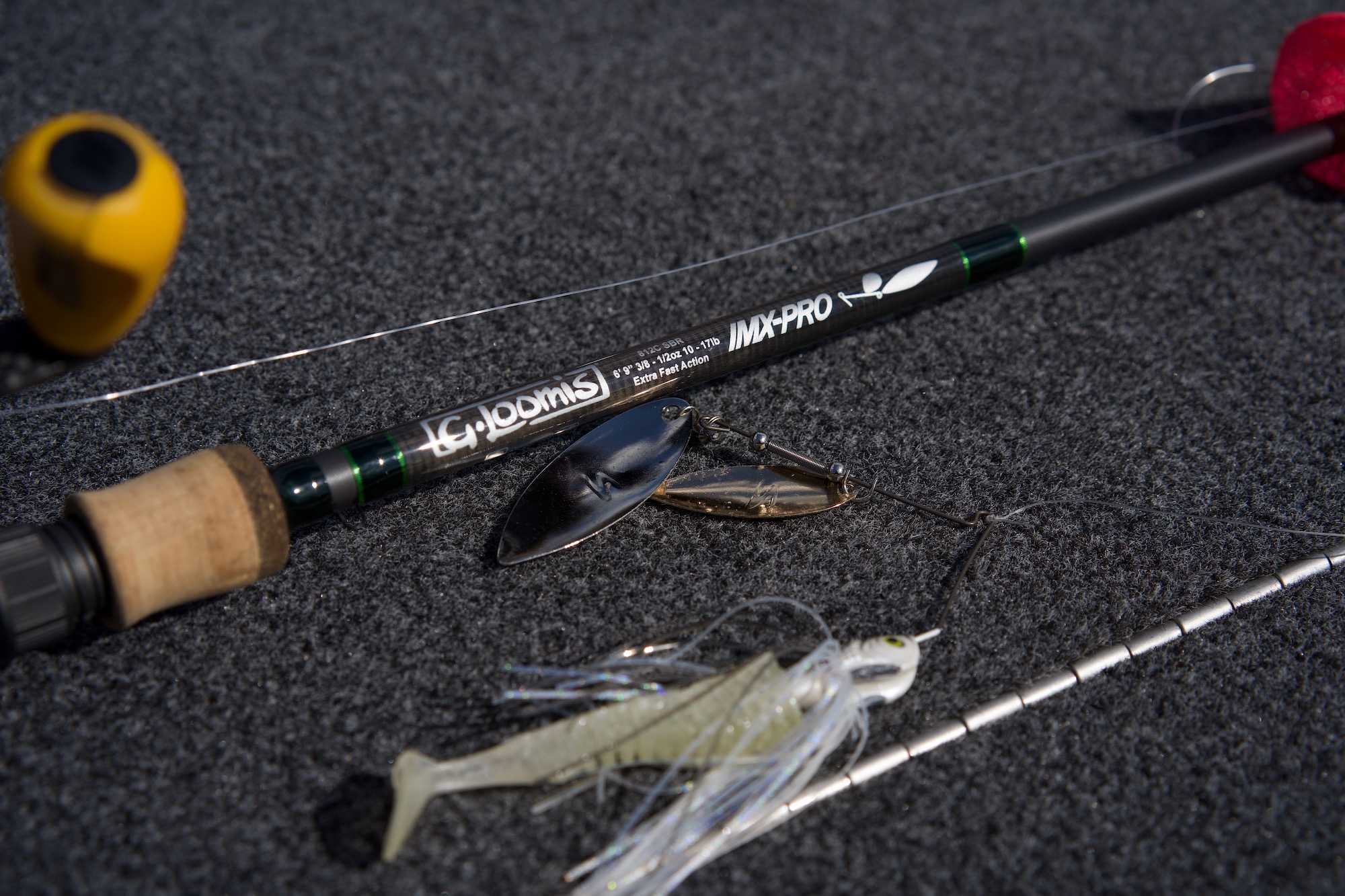 A best spinnerbait rod next to a lure