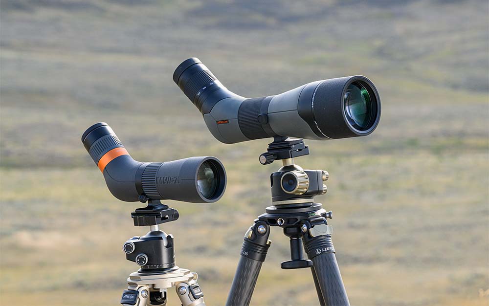 Two spotting scopes on tripods.