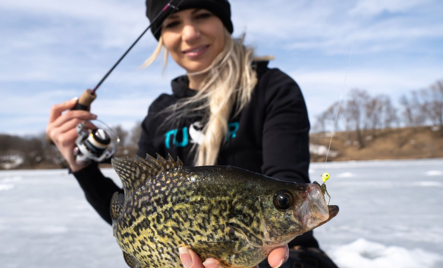 Ice fishing for crappie.