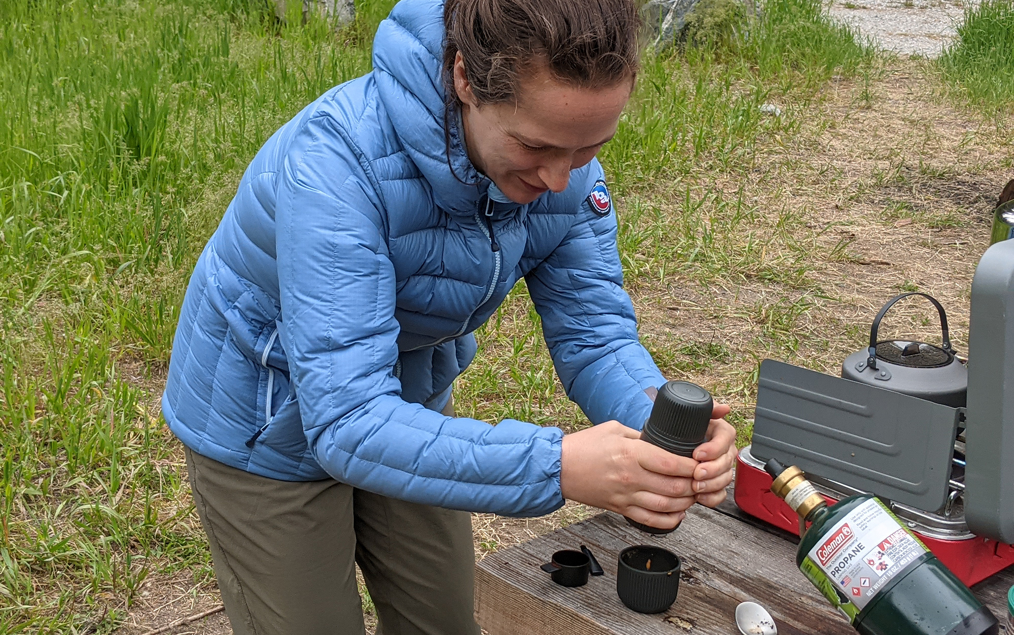 Author wearing the Big Agnes Luna jacket while using the Nanopresso.