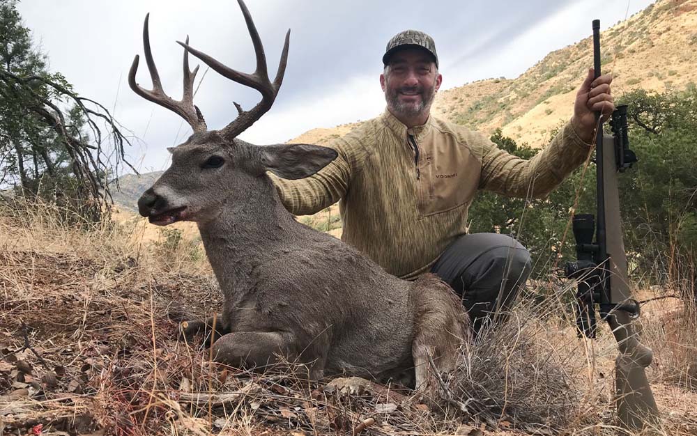 John Snow with a Coues Deer