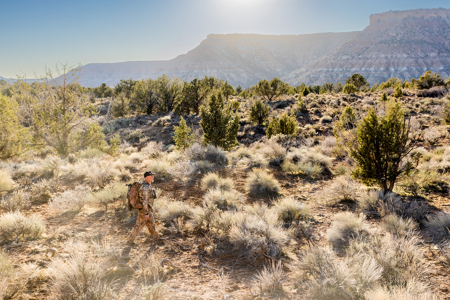Hunter walks through Utah desert