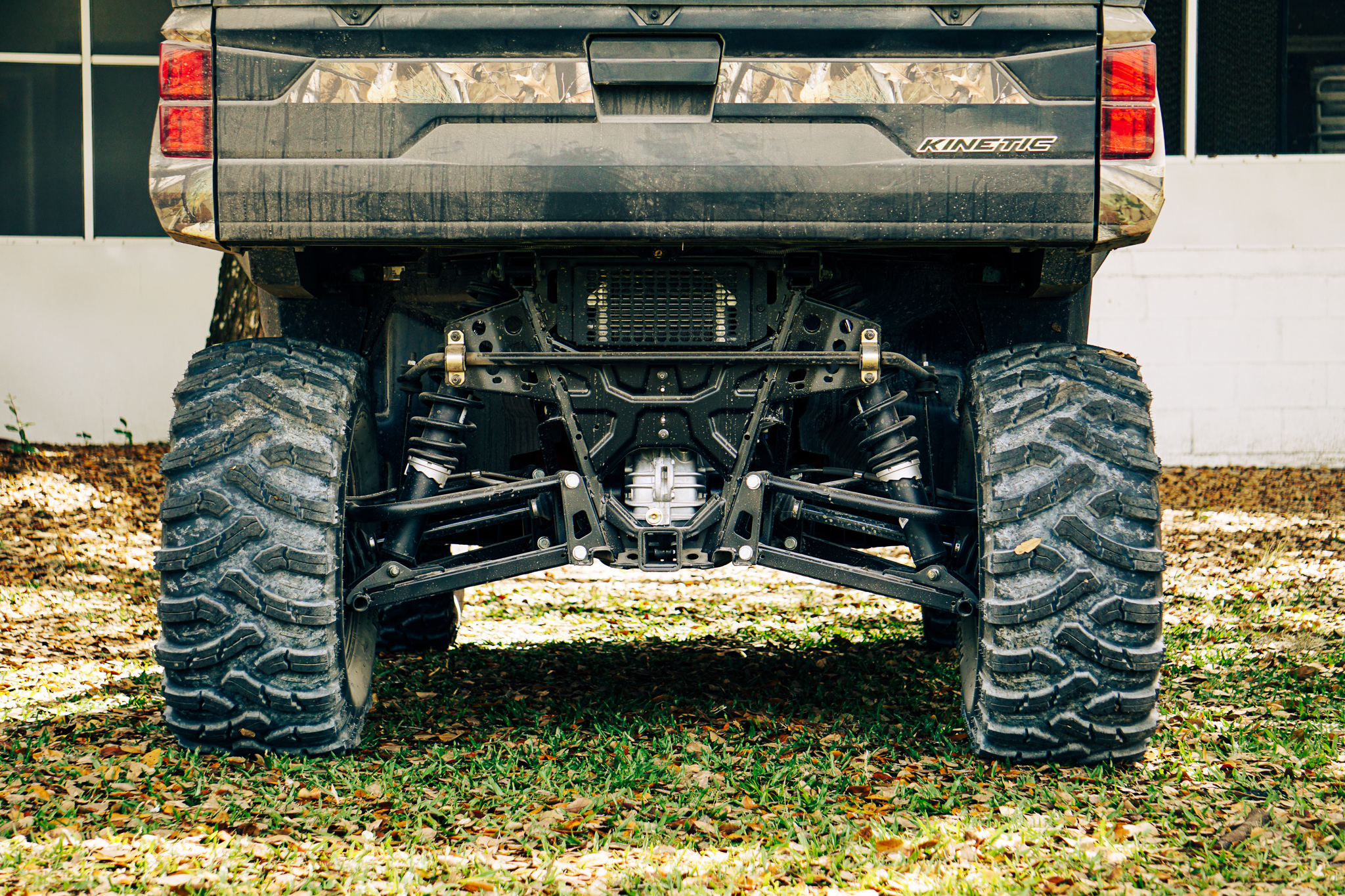The rear wheels and suspension of the Polaris Ranger Kinetic.
