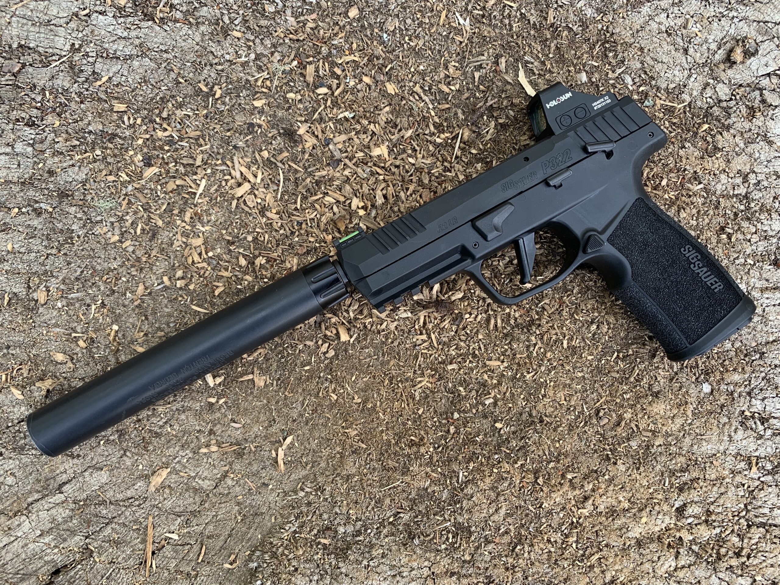 The Sig P322 fitted with a suppressor and red dot