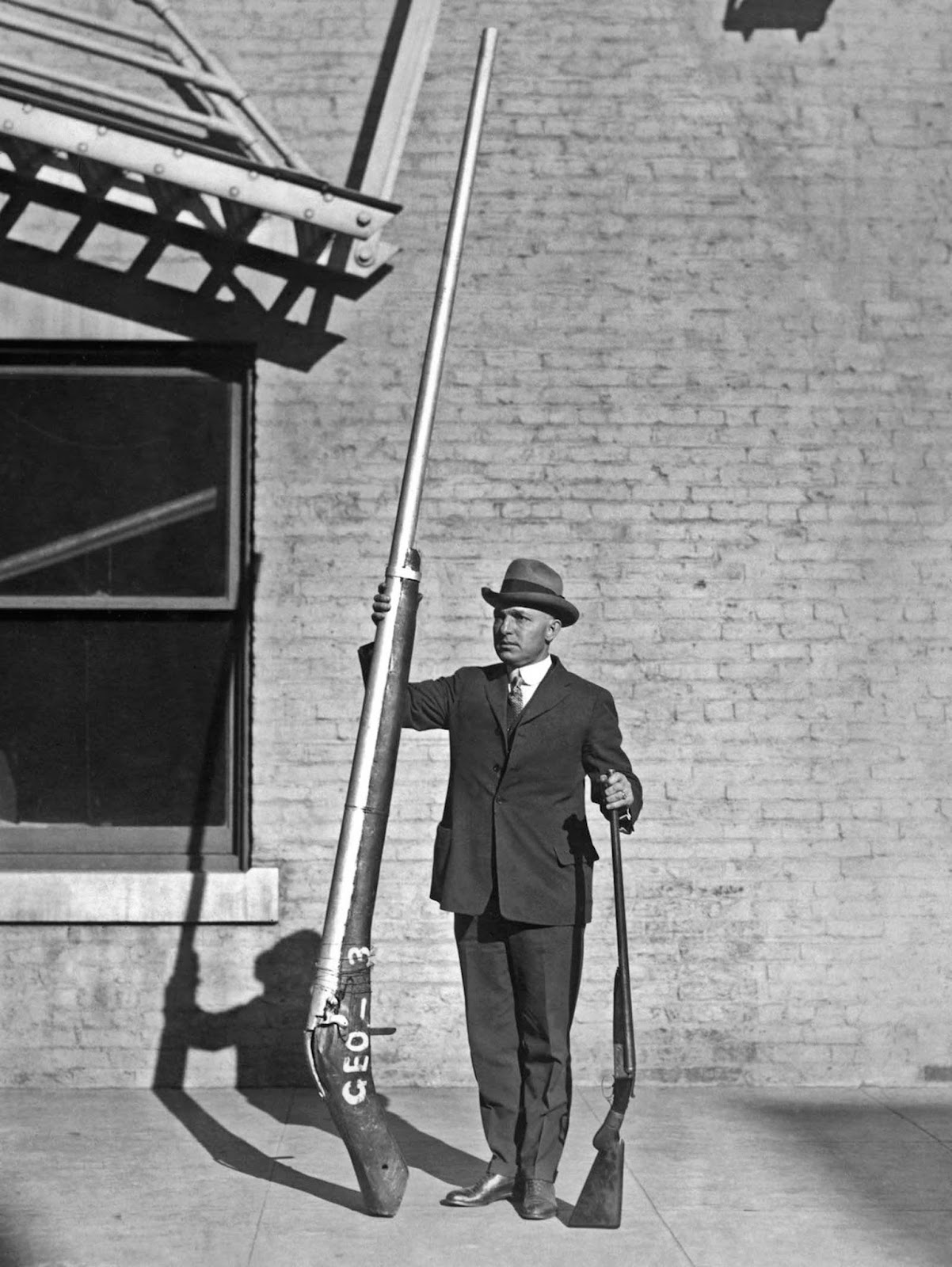 George A. Lawyer holds the confiscated punt gun.
