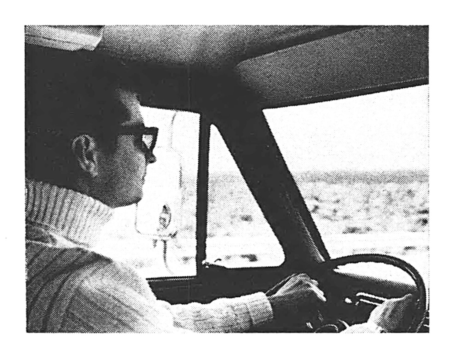 old magazine photograph man driving truck