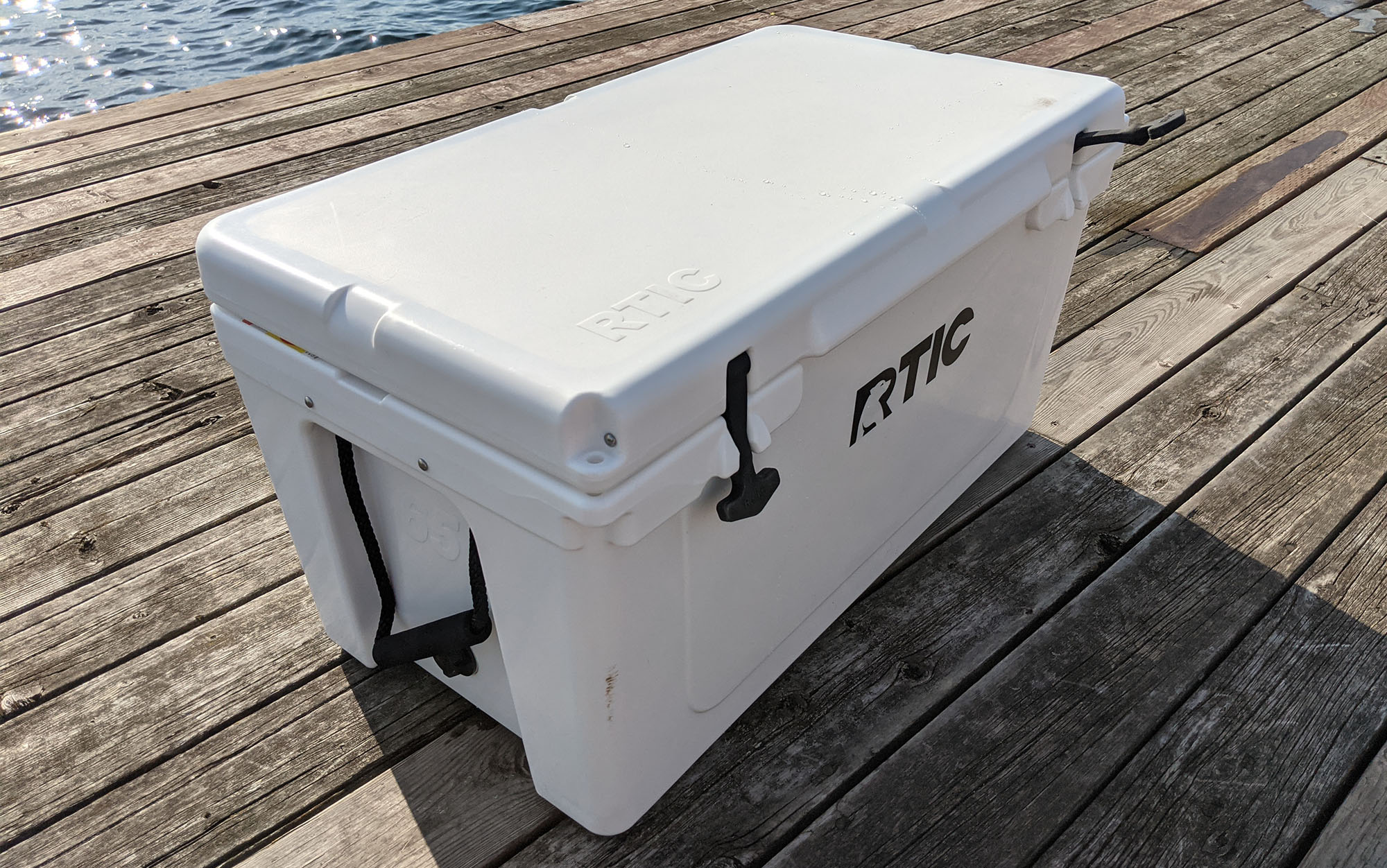 RTIC cooler sitting on a dock.