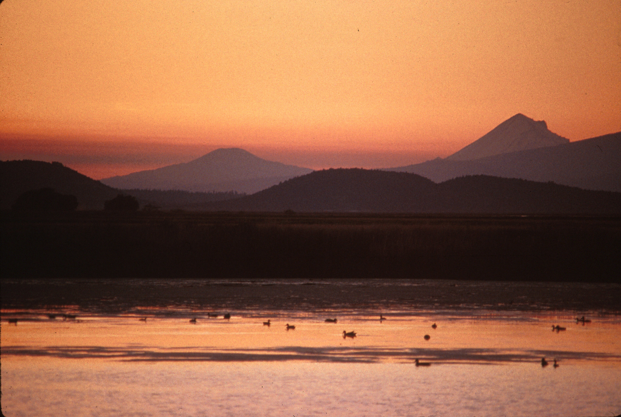 The sun sets on the upper Klamath Basin in 2011, when the refuges held more water. 