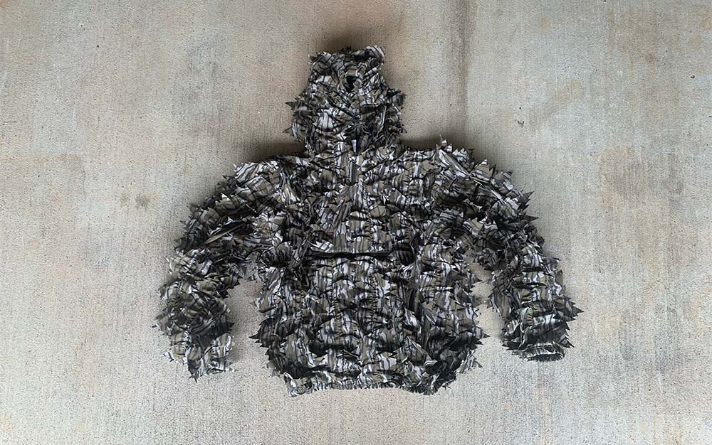 The Nomad Leafy 1/4 Zip is the best ghillie suit for timber.