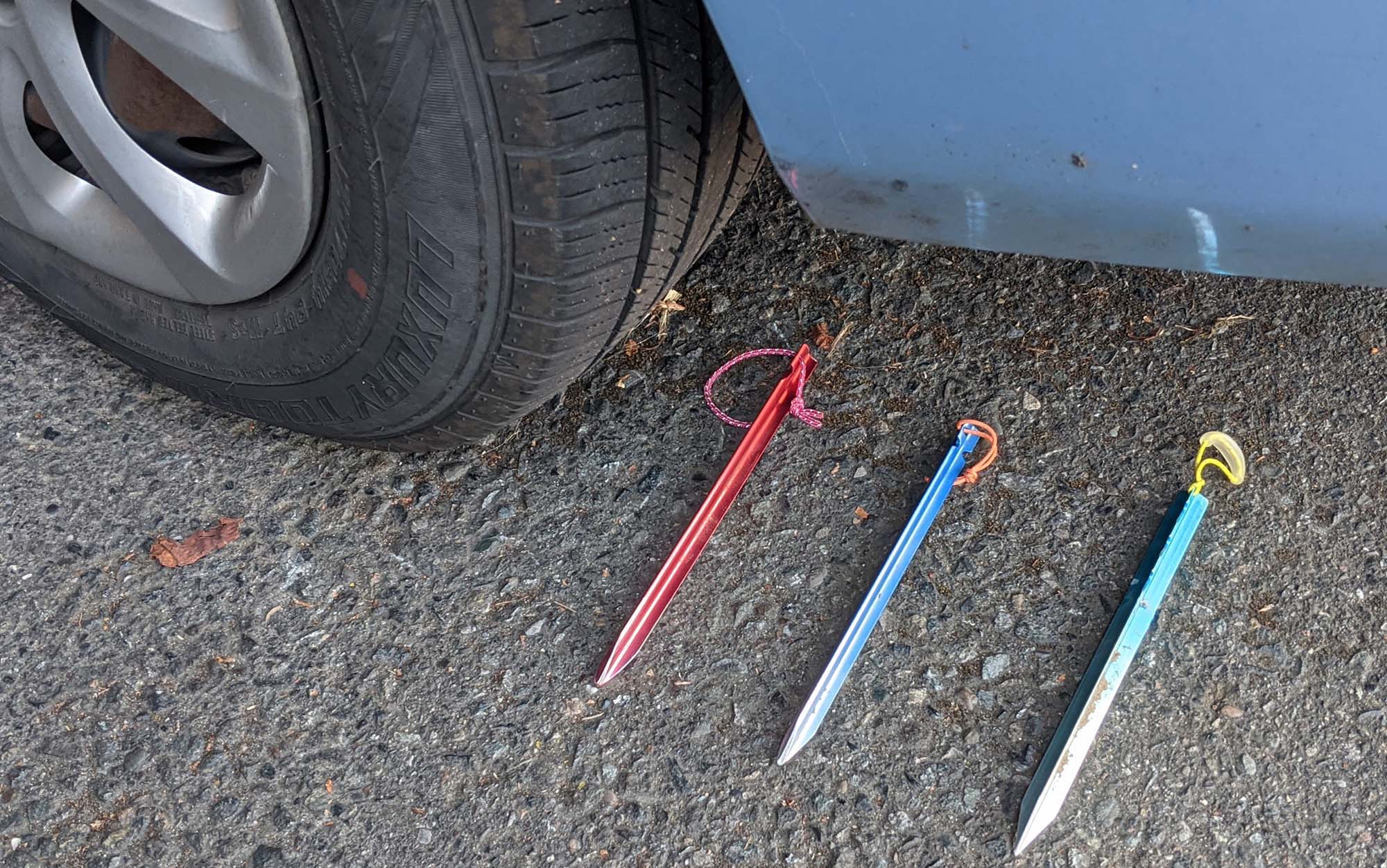 Author runs over top three best tent stakes with her car.