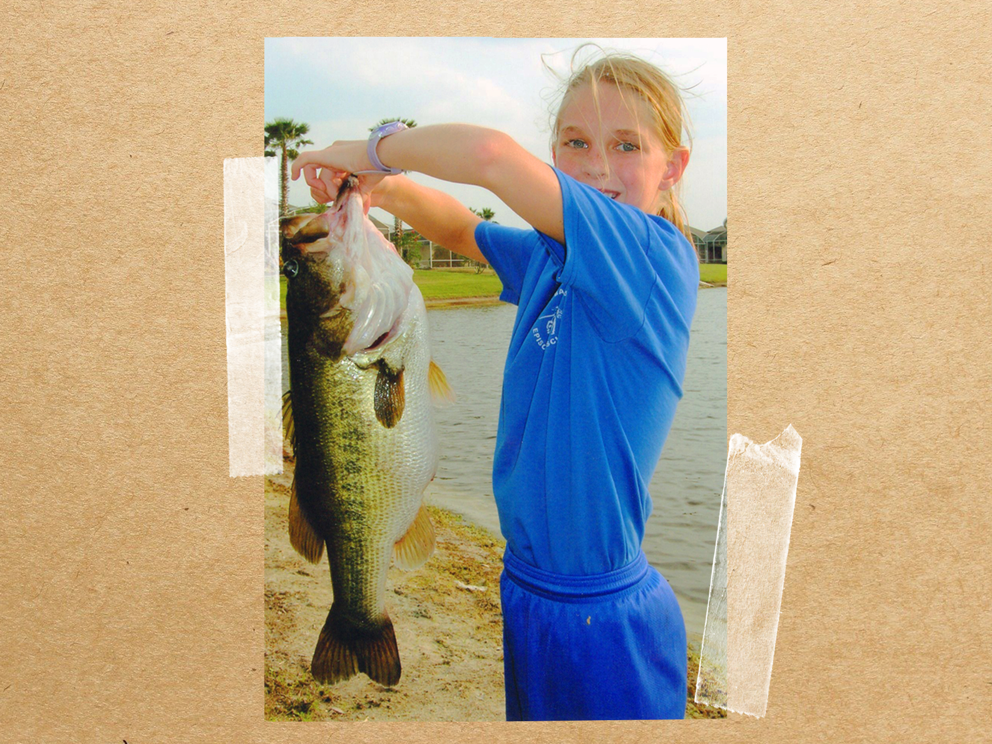 kid holding record bass