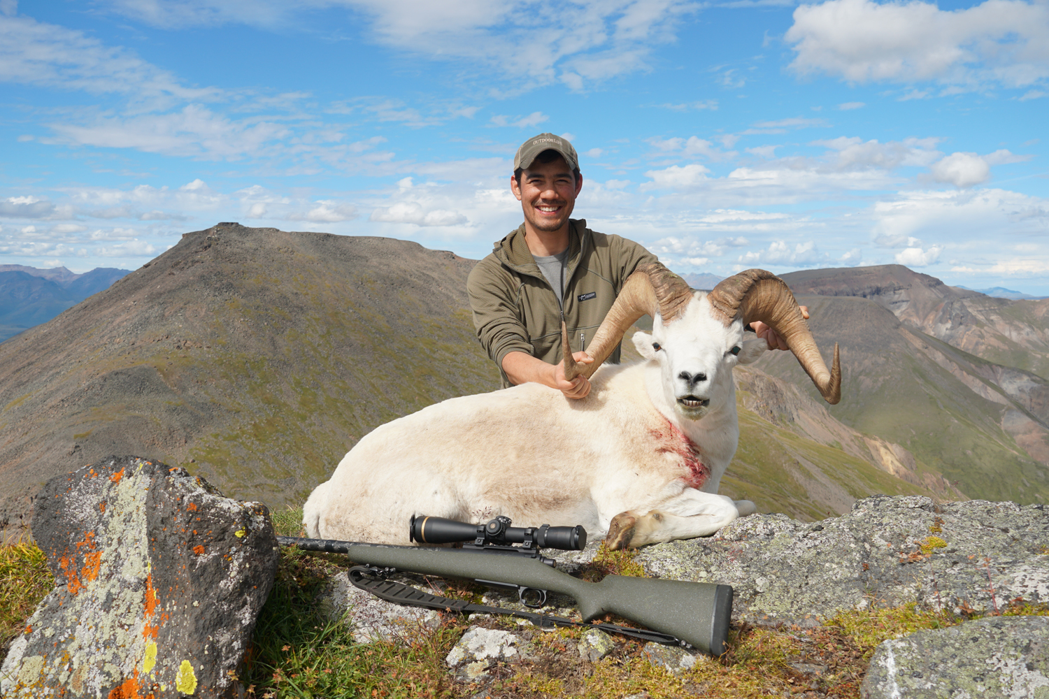 hunter with sheep