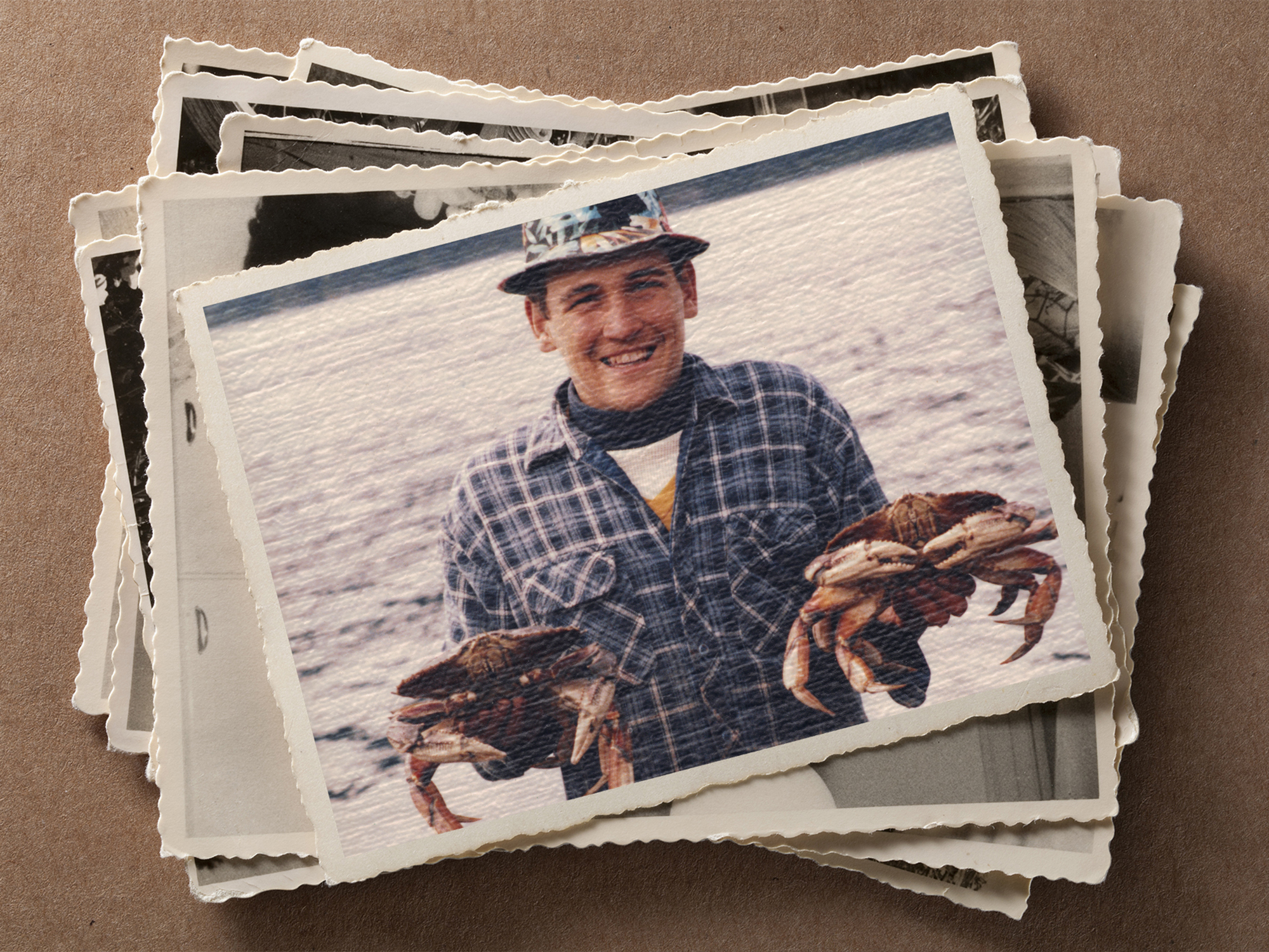 Wade Tackett holding two crabs