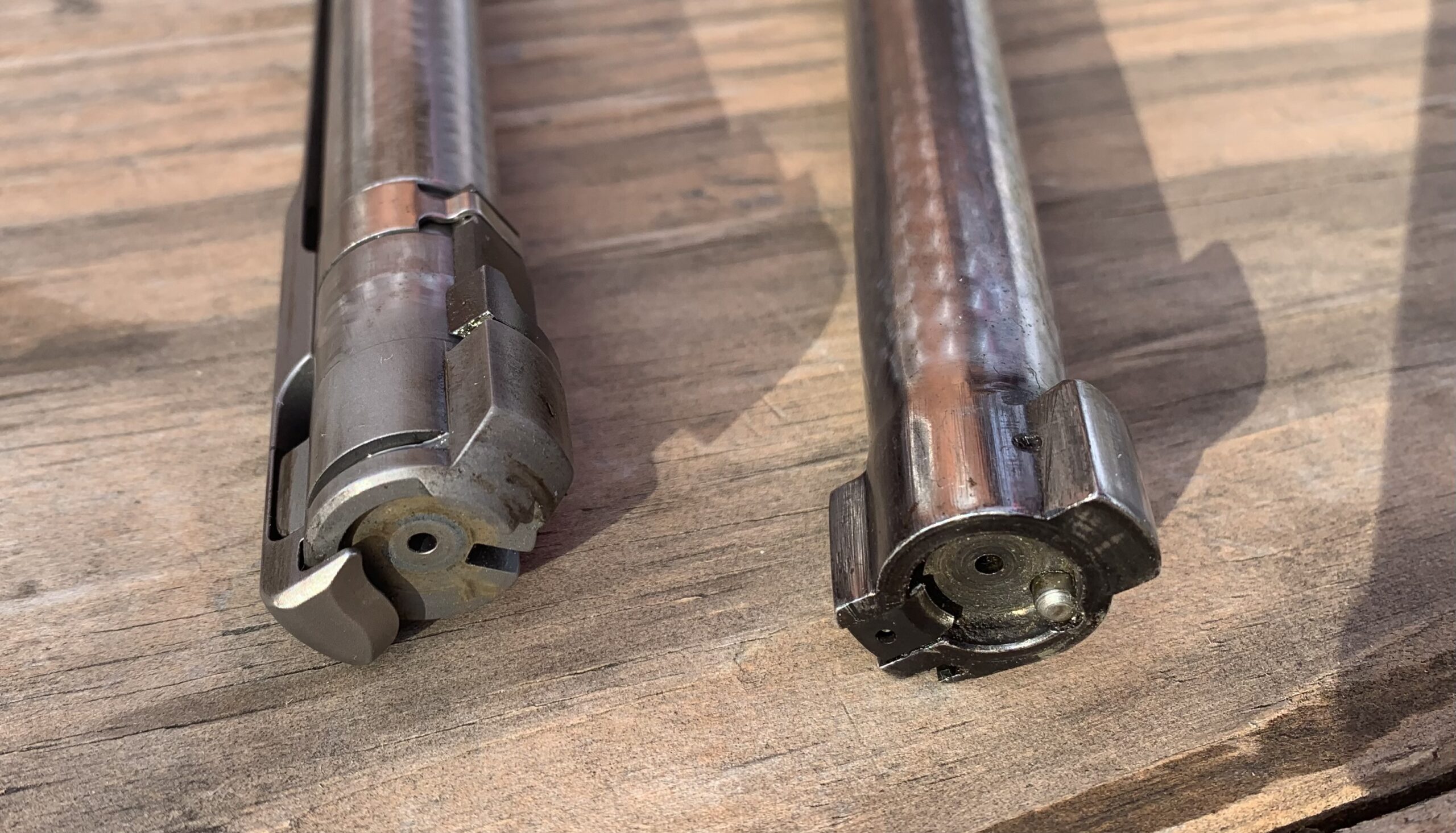 current and 1982 production M70 Featherweight bolt faces