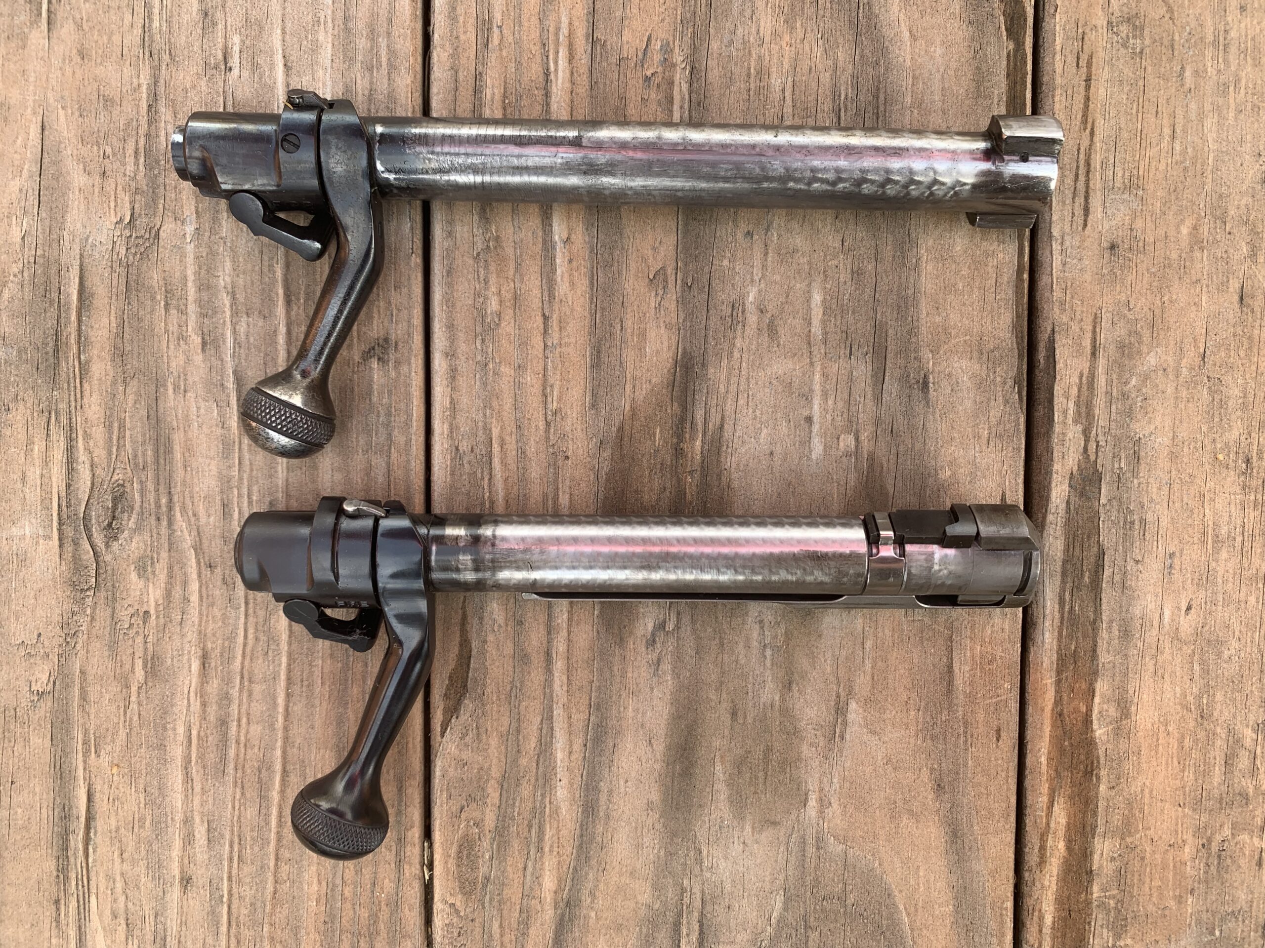 Push and controlled-feed Winchester bolts