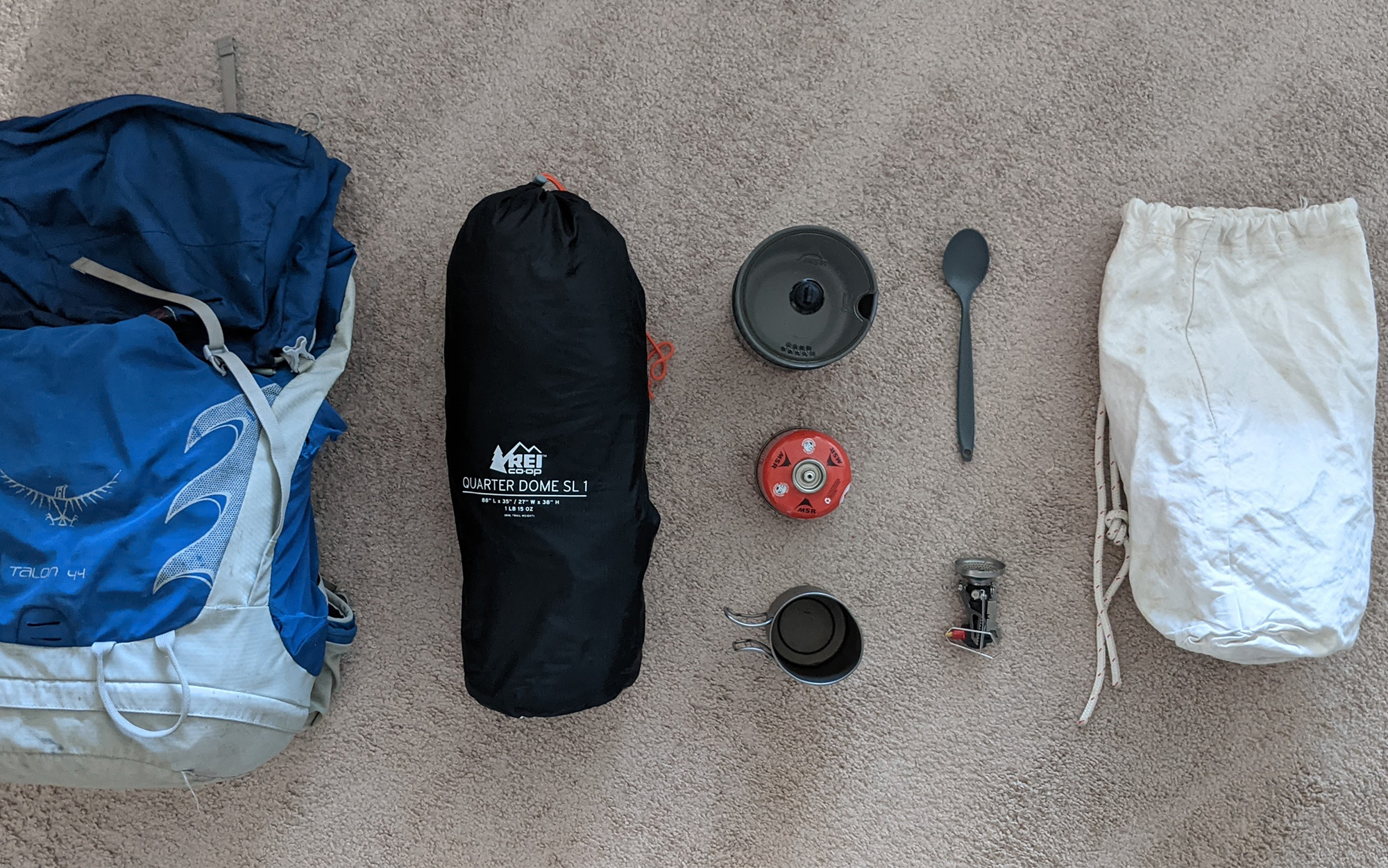 Tent, cooking supplies, and food bag go in the middle of your backpack.