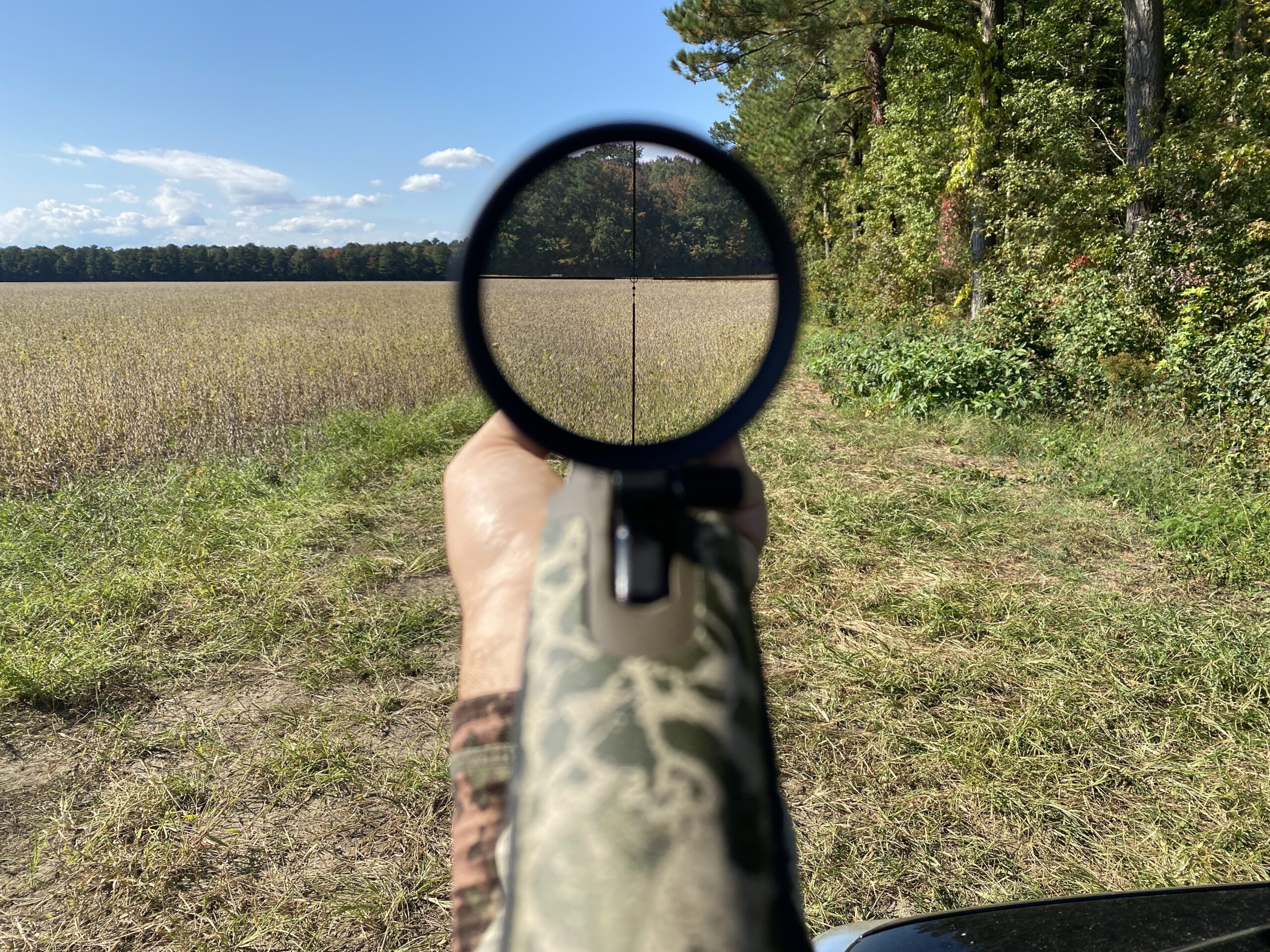 Hunter looking through the Leupold VX-Freedom UltimateSlam Reticle.