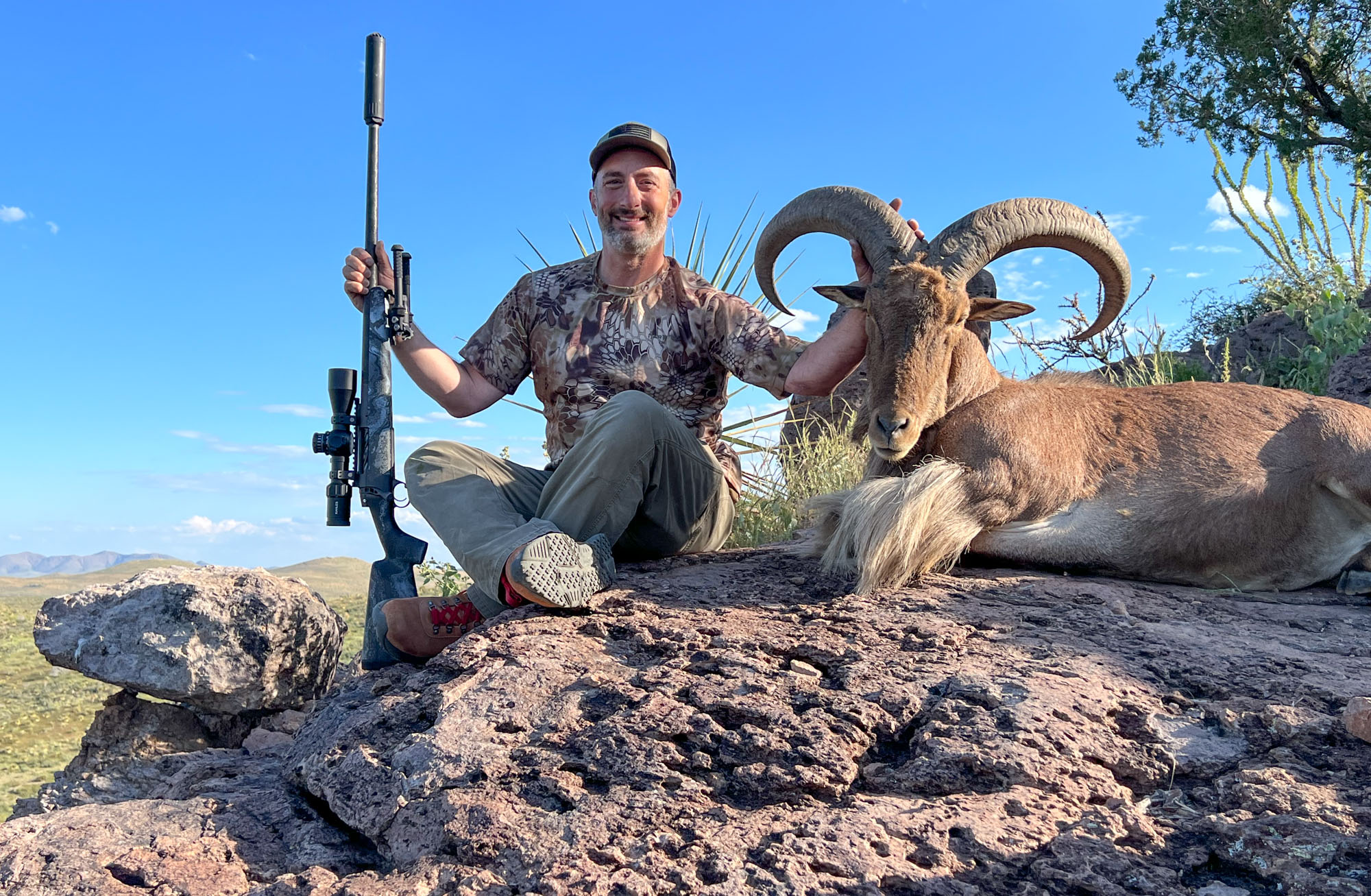 hunter with aoudad taken in west texas using a rifle in 7 PRC