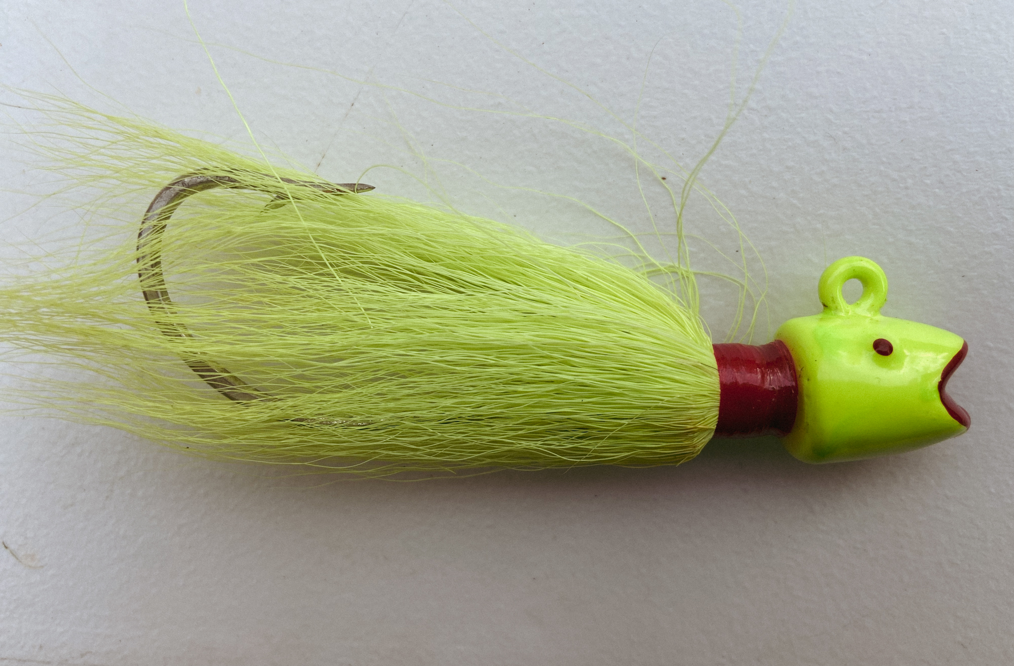 The Smiling Bill Bucktail striper lure is a great choice for surf casting.