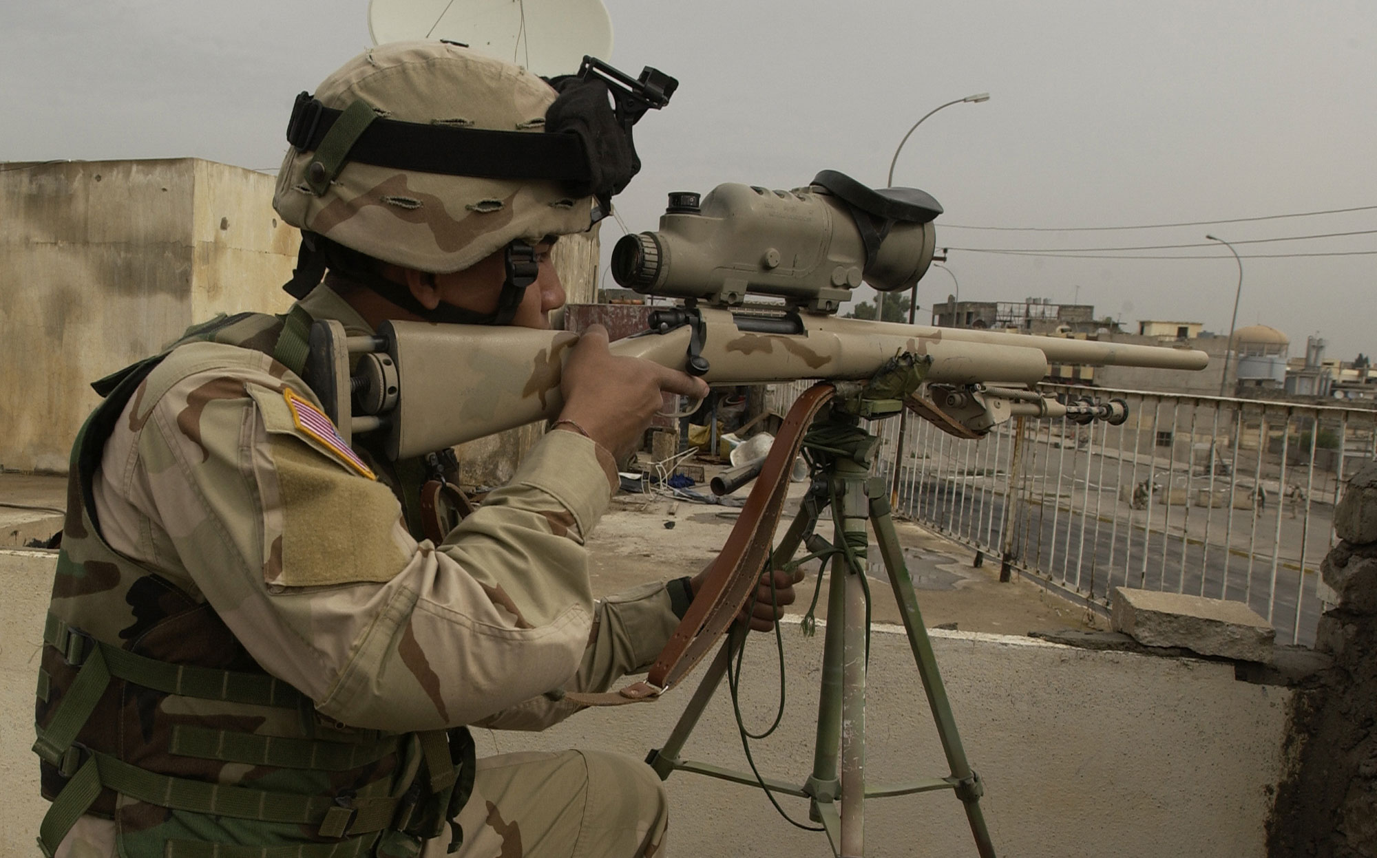 M24 sniper rifle in use by U.S. Army Spc. Chantha Bun in Mosul, Iraq in 2004. 