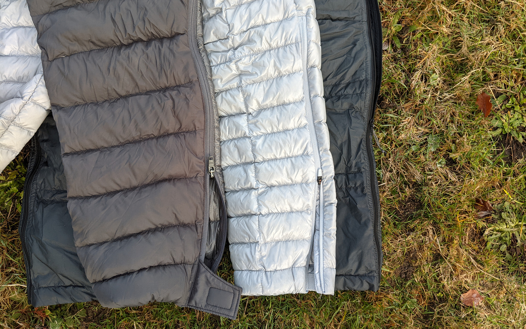 The Stone Glacier Grumman (left) had a two-way side zip, which made it easier to take off than either the Mountain Hardwear Ghost Whisperer Pant (center), which had a zip that ran from the hem up to the mid-calf or the KUIU Super Down ULTRA Pant (right) which had a one-way zip that runs down from the waist. 