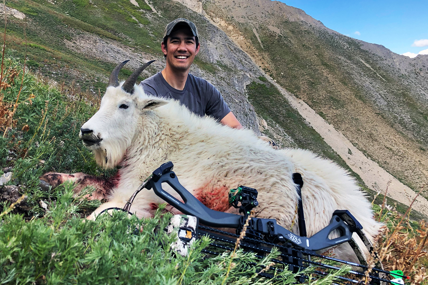 bowhunter with goat