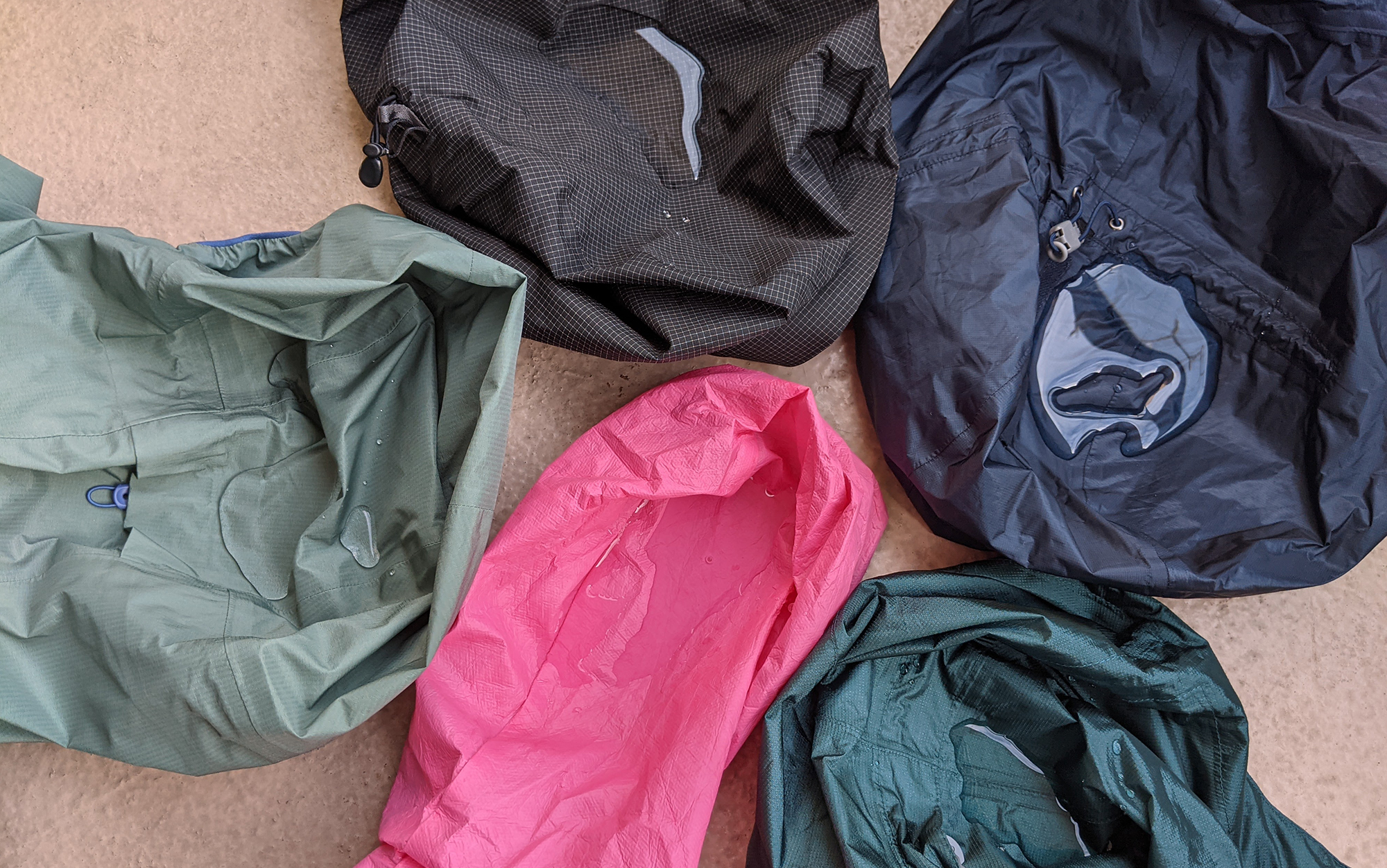 The five rain jackets in my test were left with a small pool of water on the hood for twenty-four hours to see if the material would breach the fabric. 