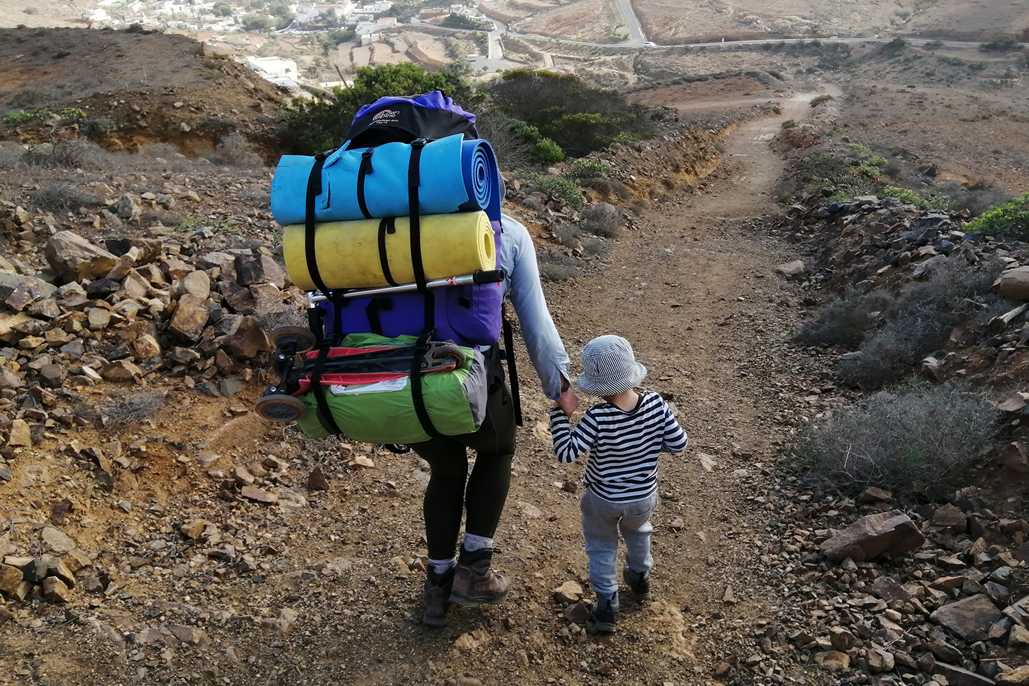 mother, small son backpacking