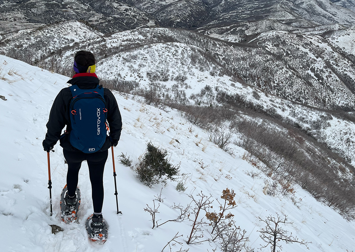 The author snowshoes with one of the best winter backpacks.