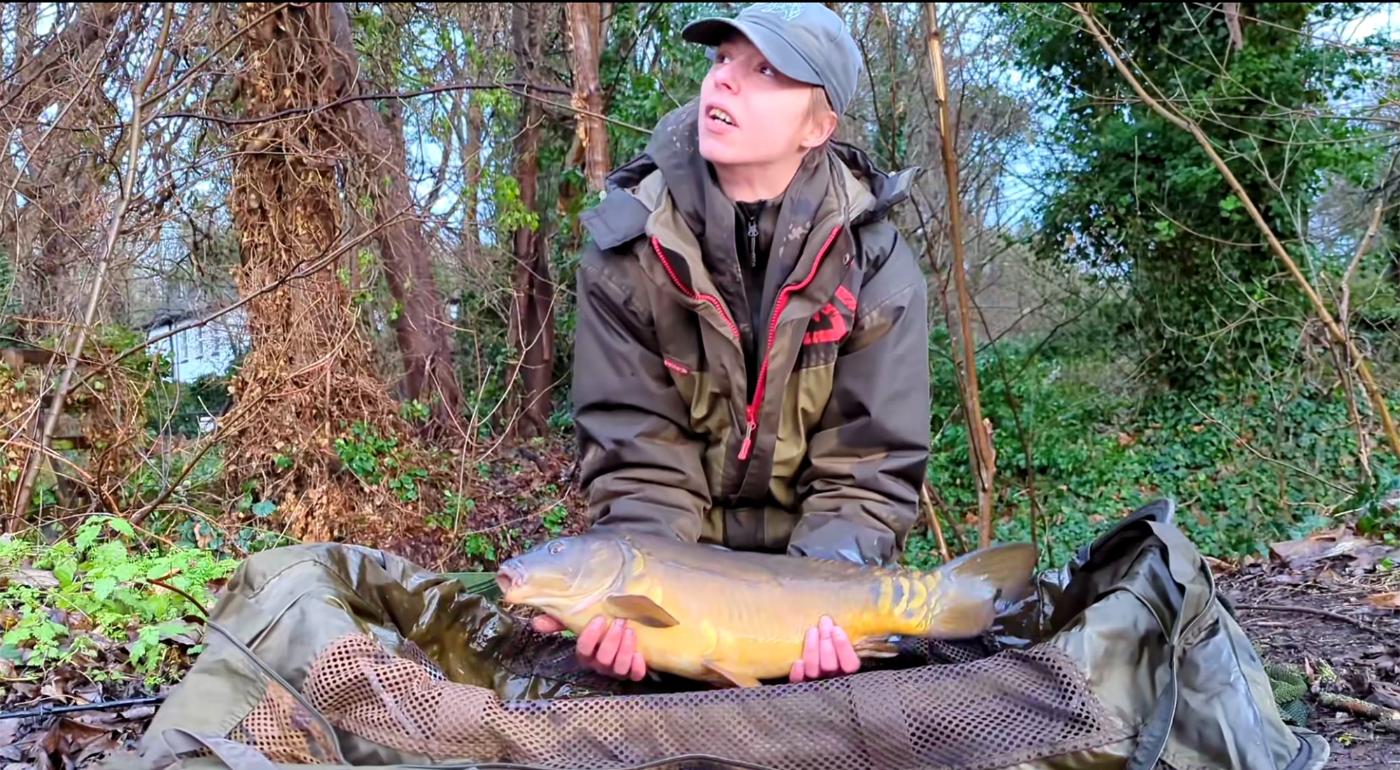 Watch a British Angler Keep Her Cool While an Irate Onlooker Cusses Her Out