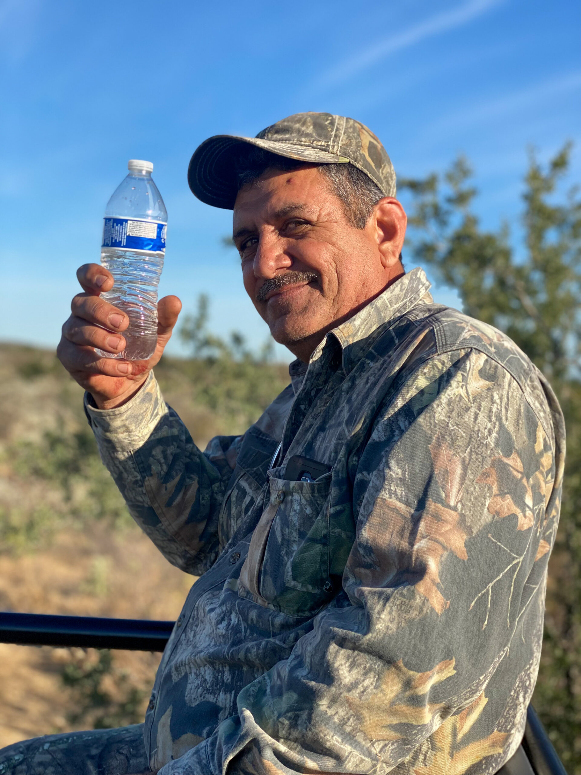 hunting guide holds water bottle