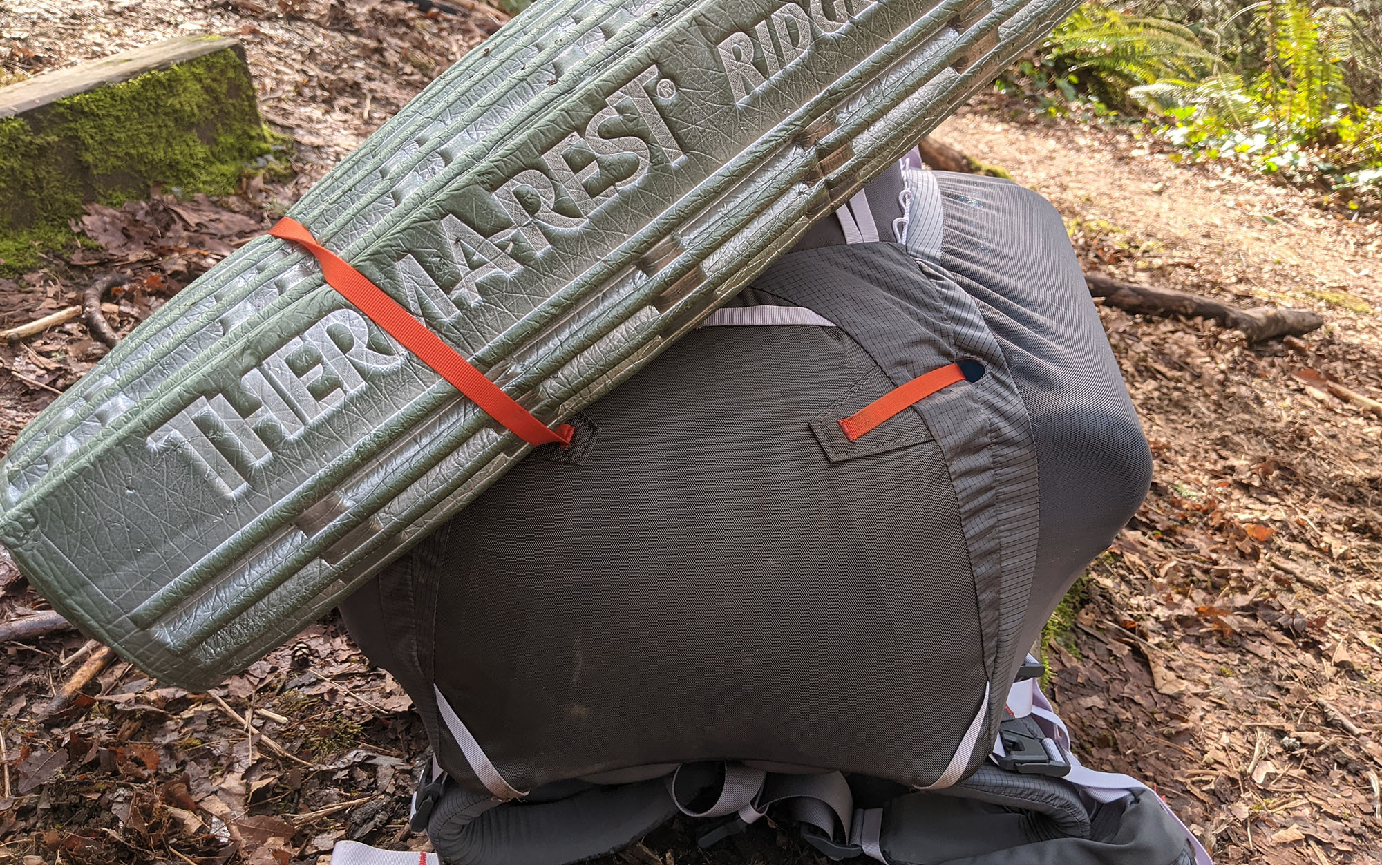 I was able to attach a closed-cell foam pad to the bottom of the Big Agnes Garnet using the compression straps, but it was a little tricker to do than with other packs that use dedicated straps for this purpose.