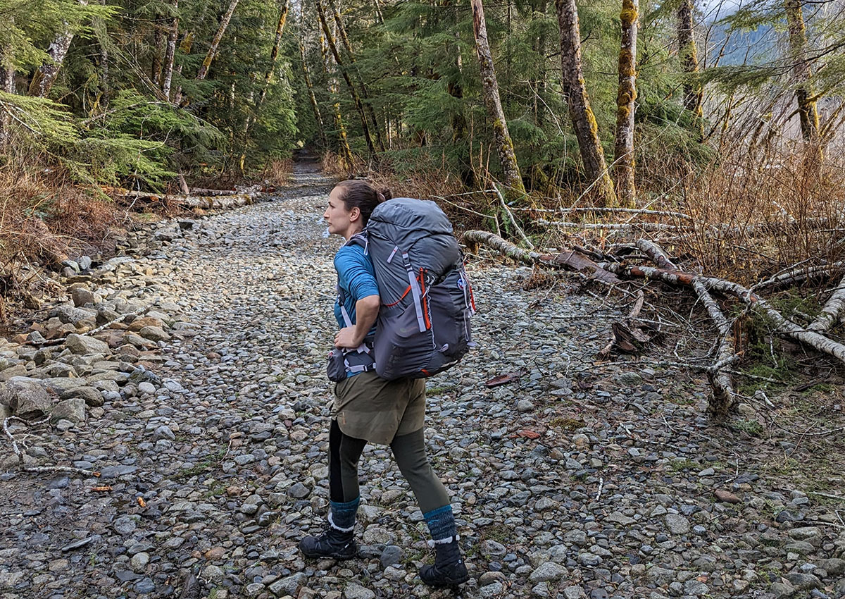 The author wears the Big Agnes Garnet backpack on trail.