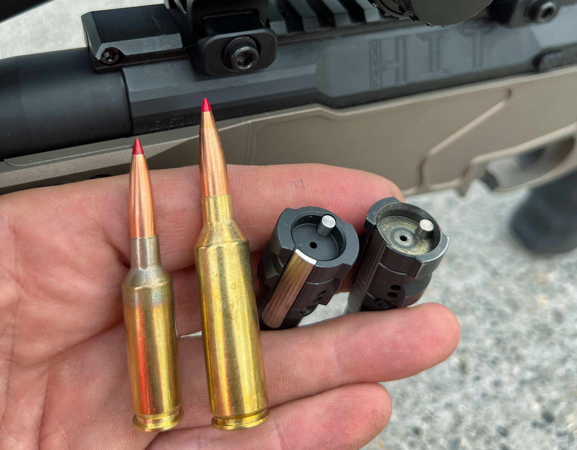 Bolt heads and cartridges in hand