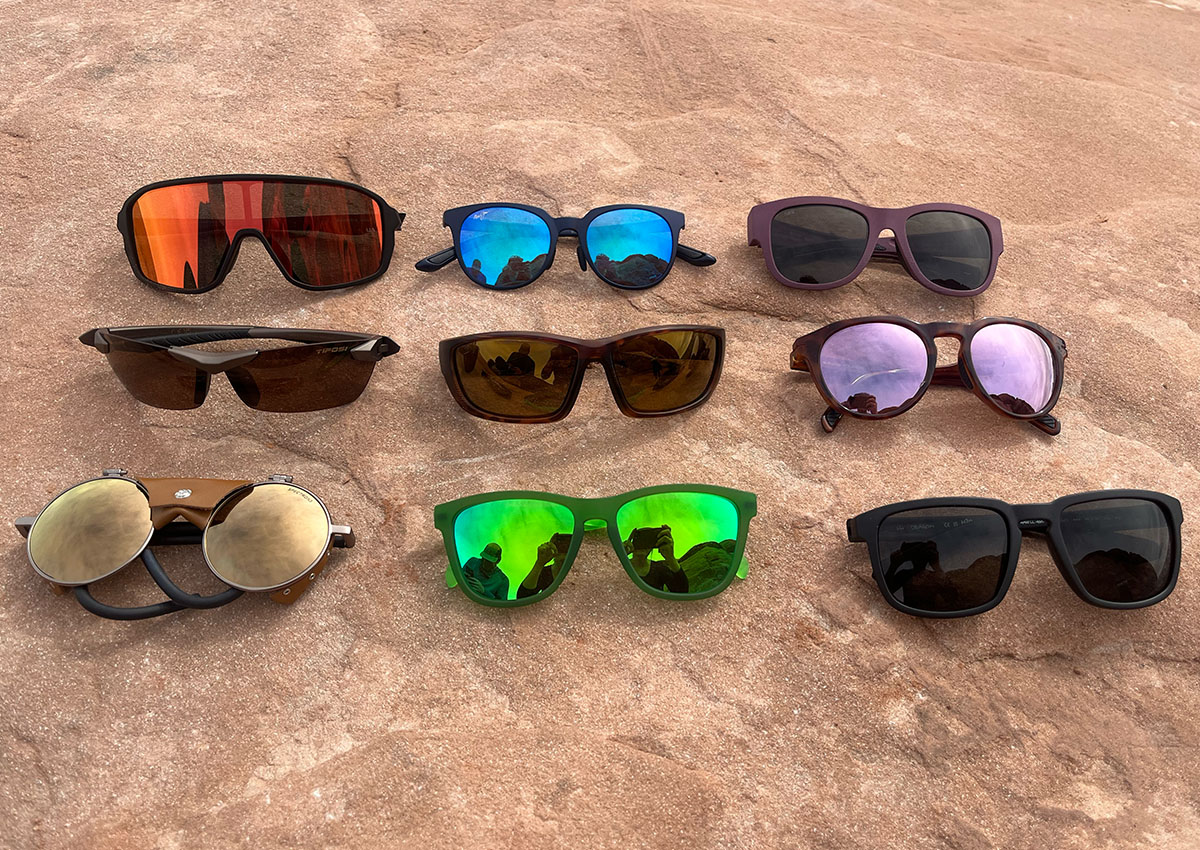 The best hiking sunglasses sit on a rock.