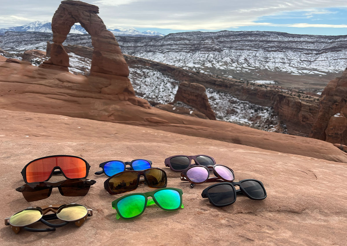 The best hiking sunglasses sit in front of Delicate Arch.