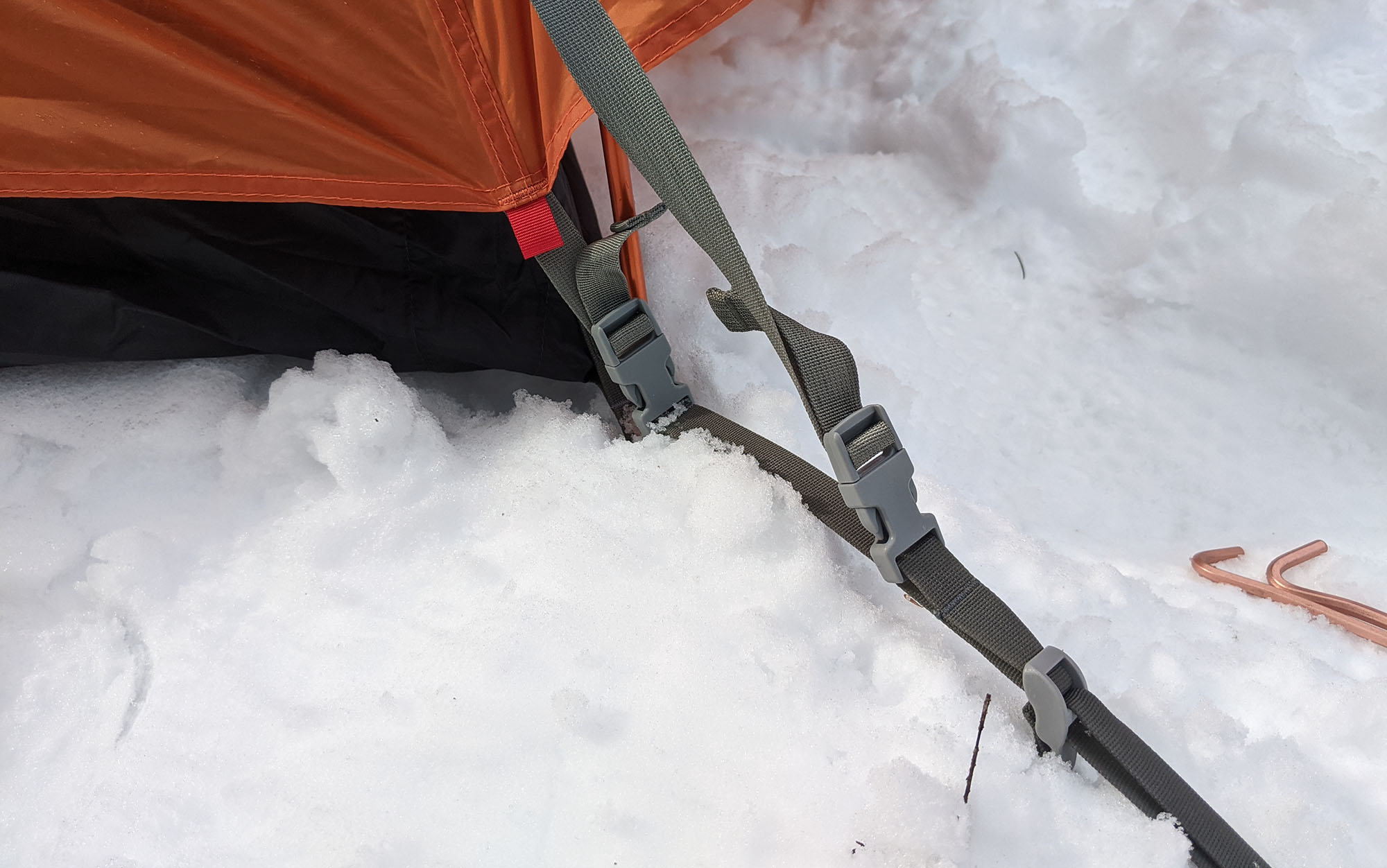 The double straps of the Marmot Fortress were fiddly to use and did not provide a level of tension that I would be comfortable with in adverse conditions.
