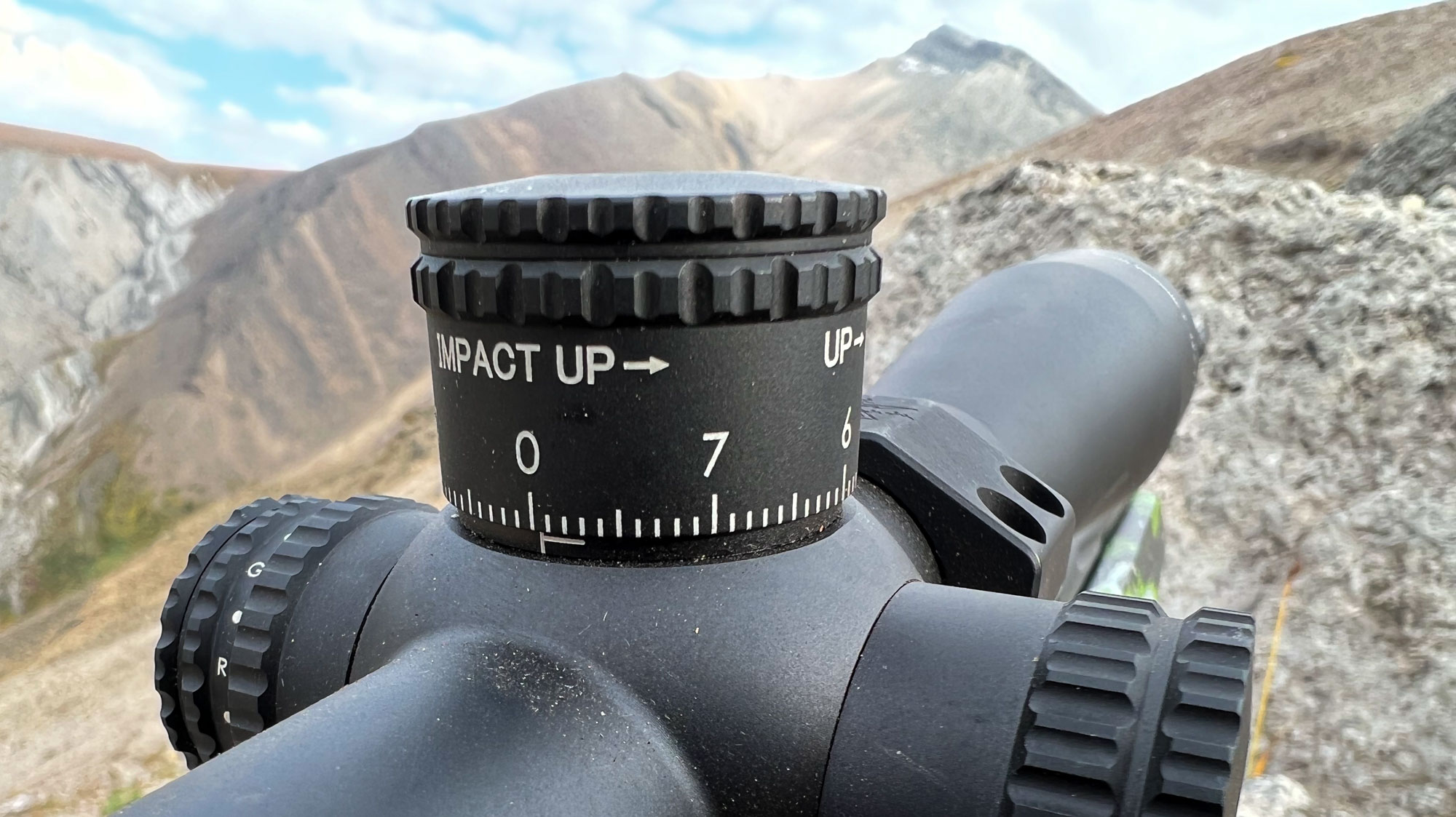Detail of hunting scope in mountains