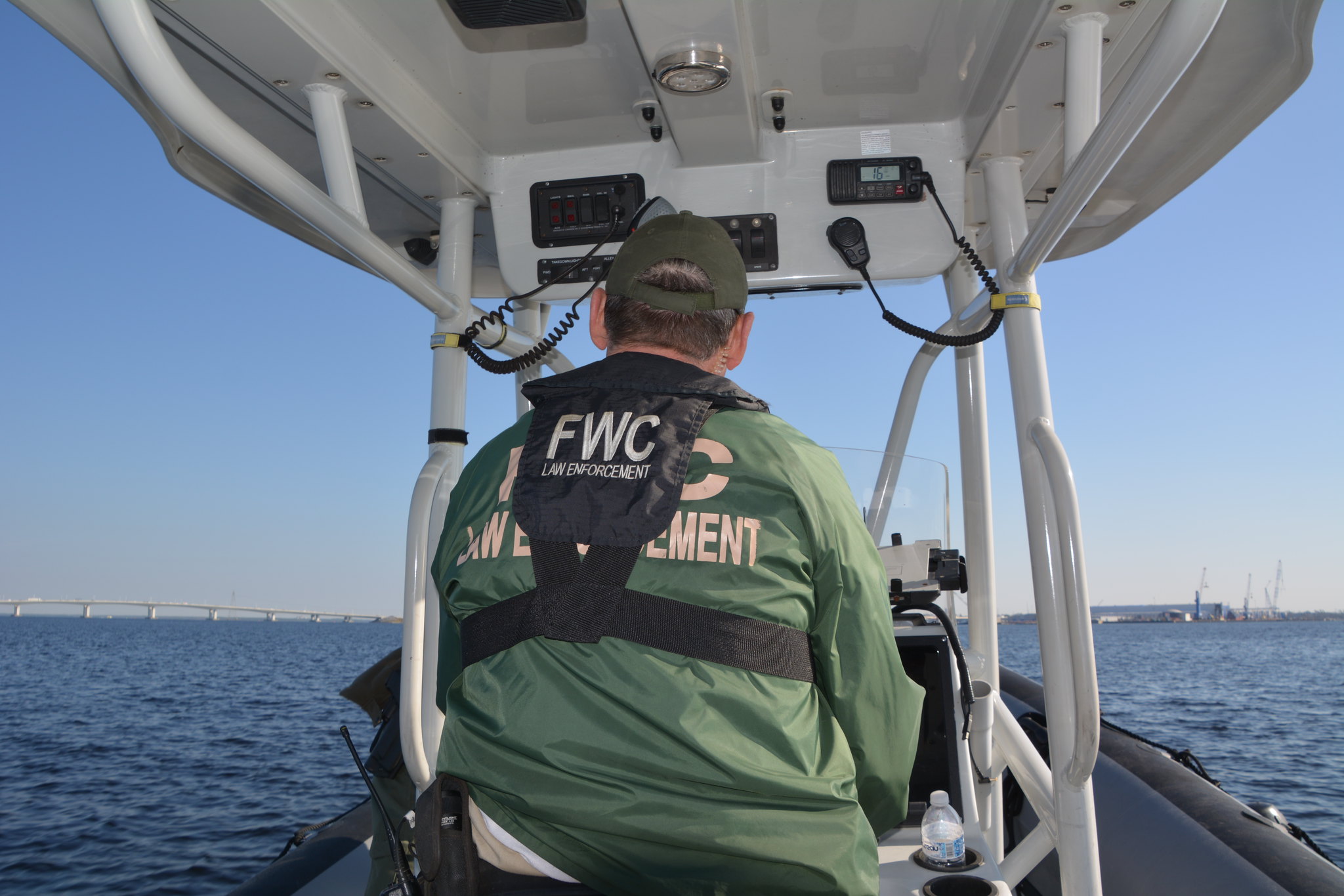 A conservation officer in a boat in Florida.