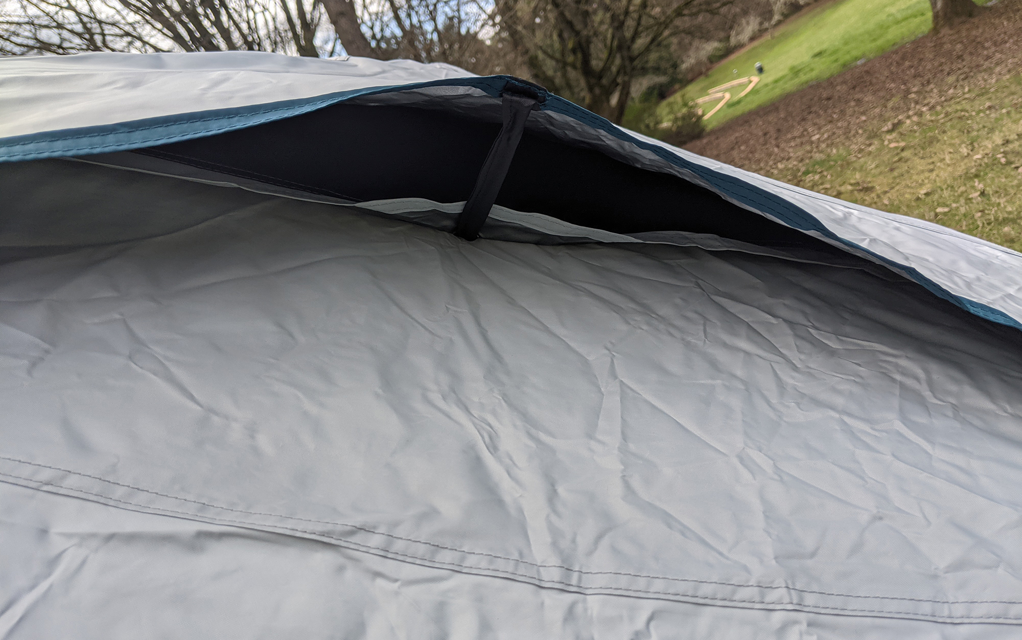 Very small vents provide the only possible inlet for this extremely dark tent.