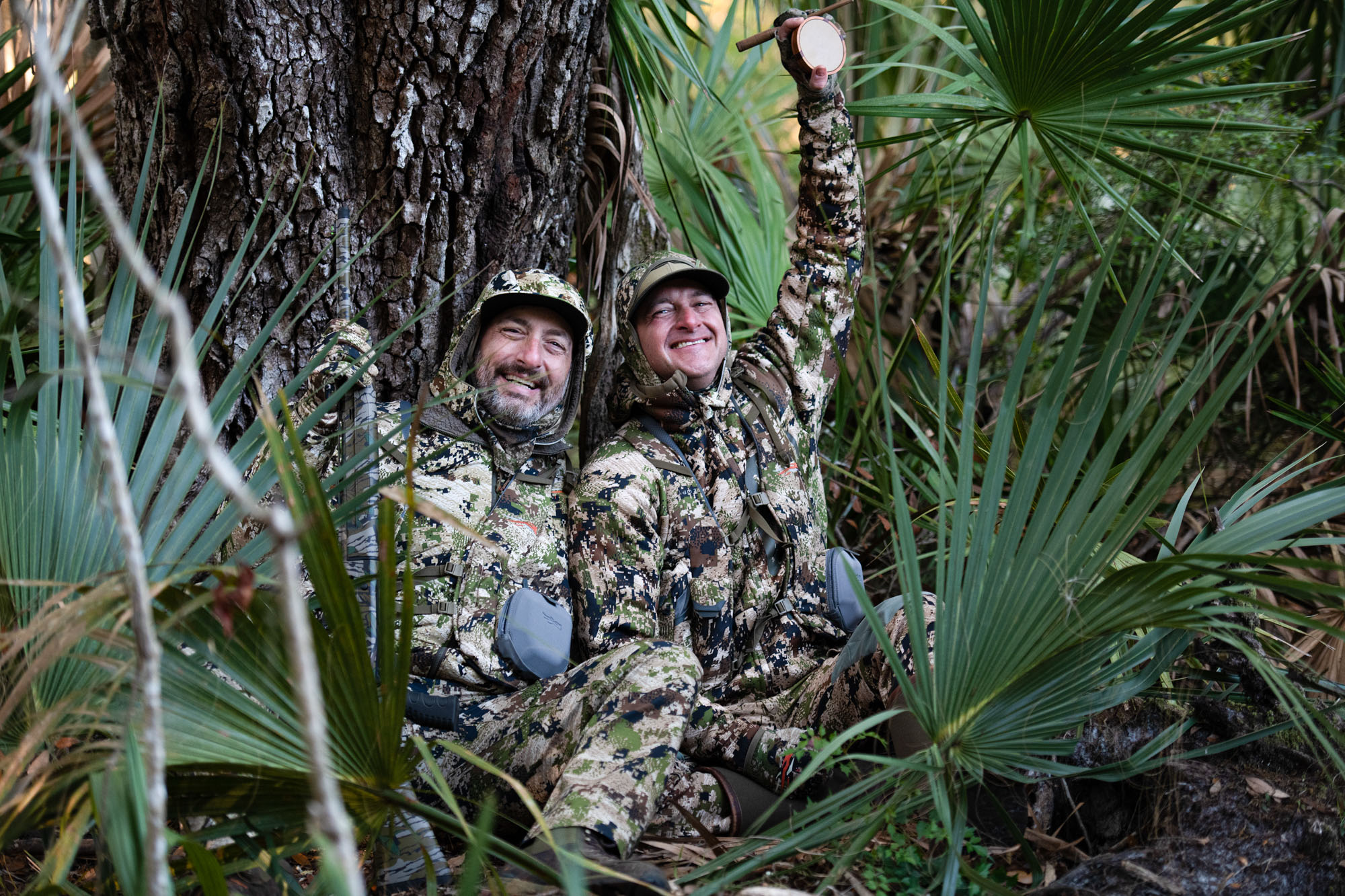 The author (left) and guide Gray Dutton celebrate after a successful Osceola turkey hunt at Florida Outdoor Experience. 