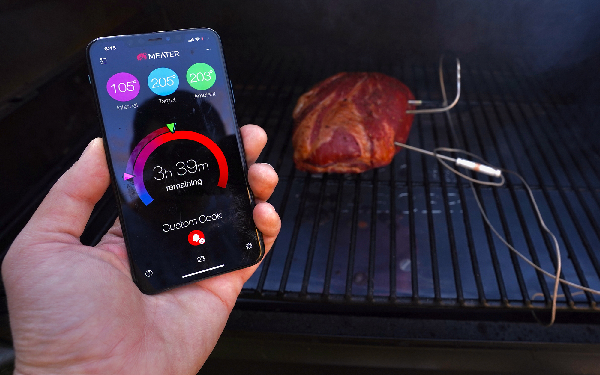 The Meater wireless meat thermometer takes both the ambient and internal temperatures.