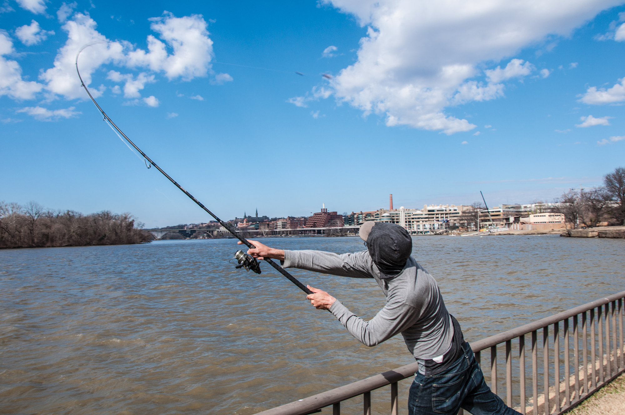 A man fishing along the Potomac.