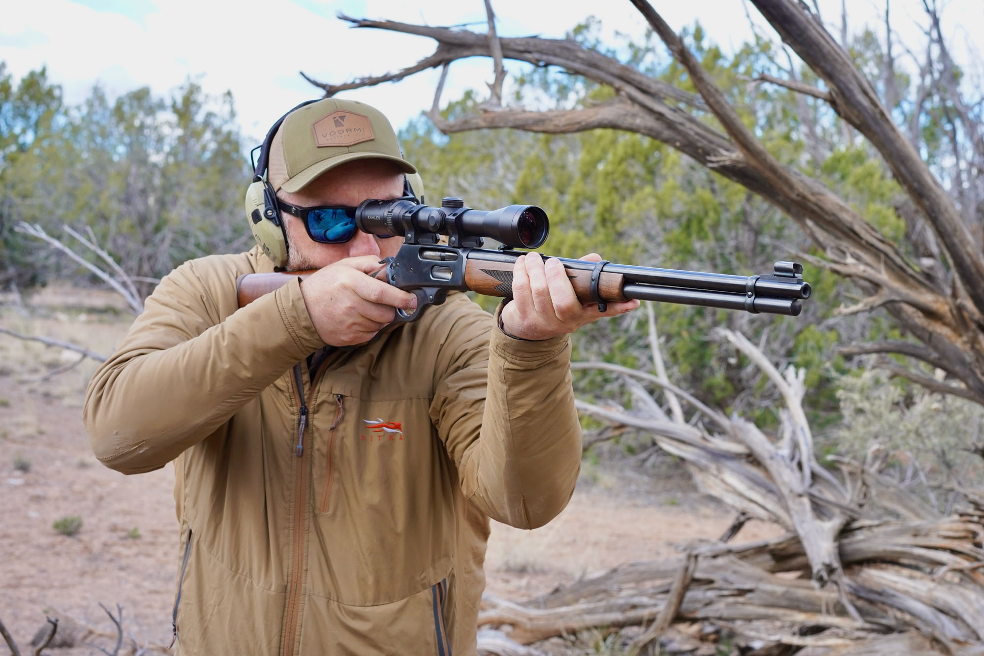 Shooting the best rifle of 2023, the Marlin 336, offhand.