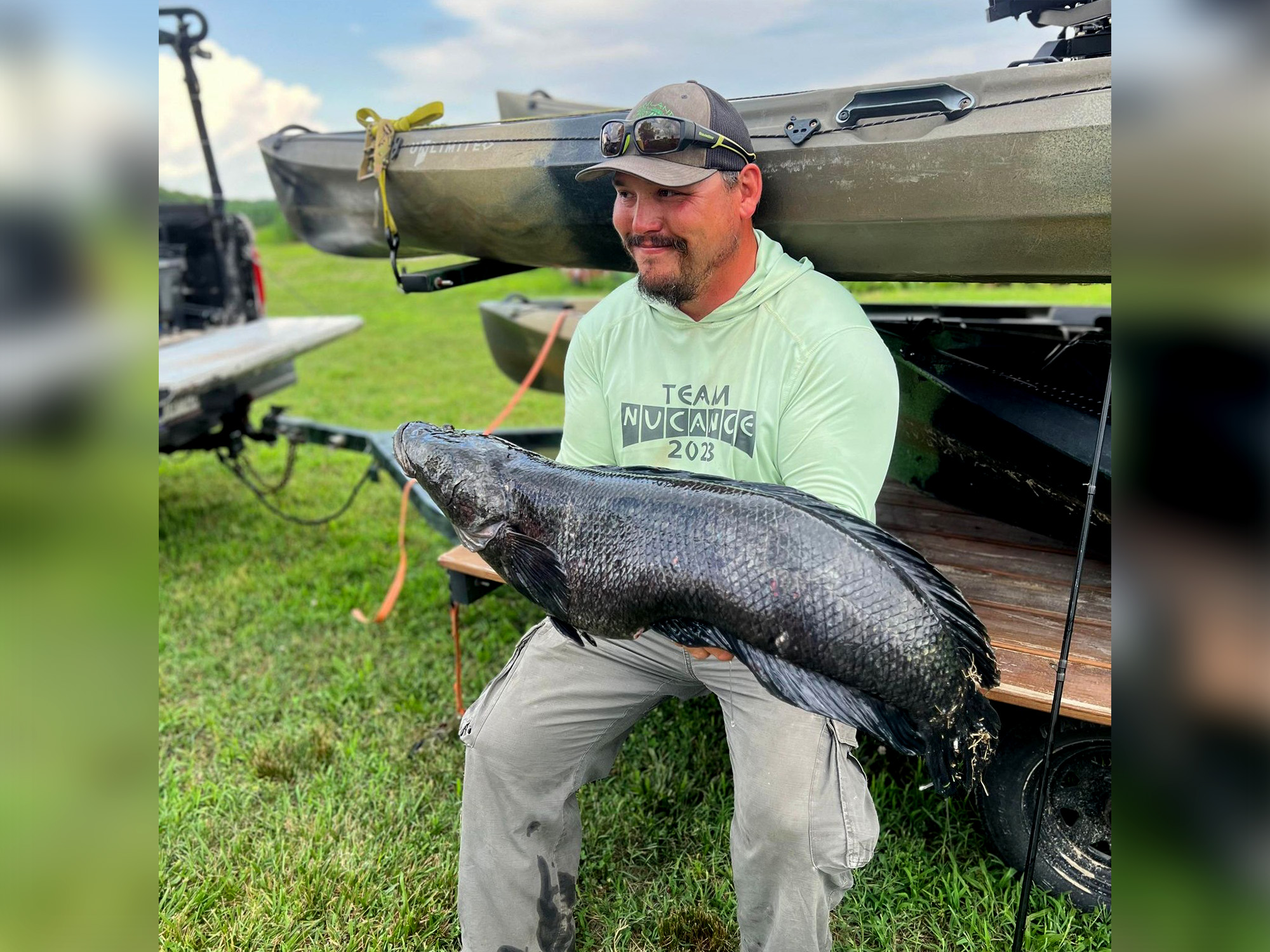 Damien Cook with the new Maryland state-record snakehead.