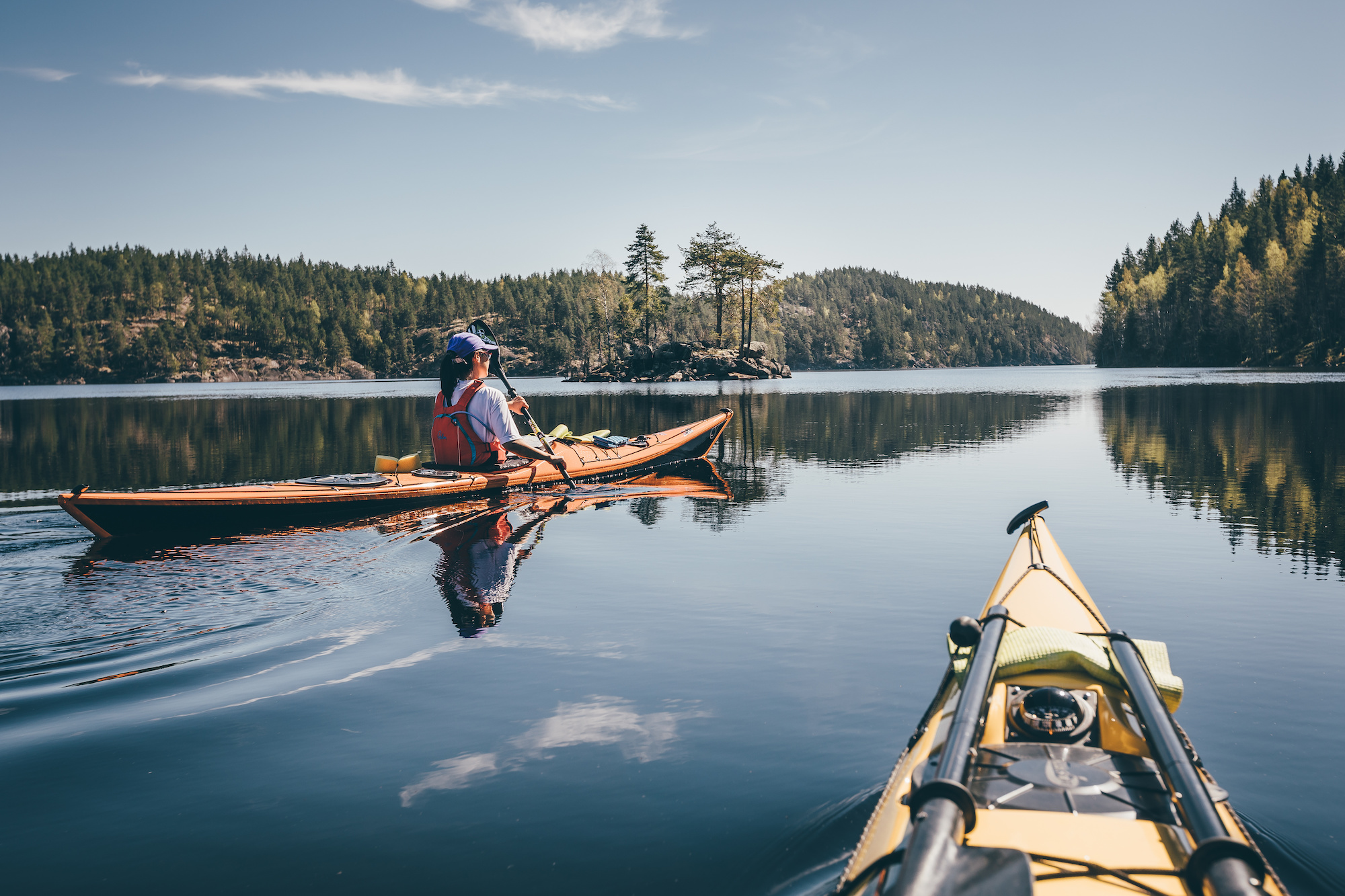what to wear when kayaking, paddling across glass in summertime