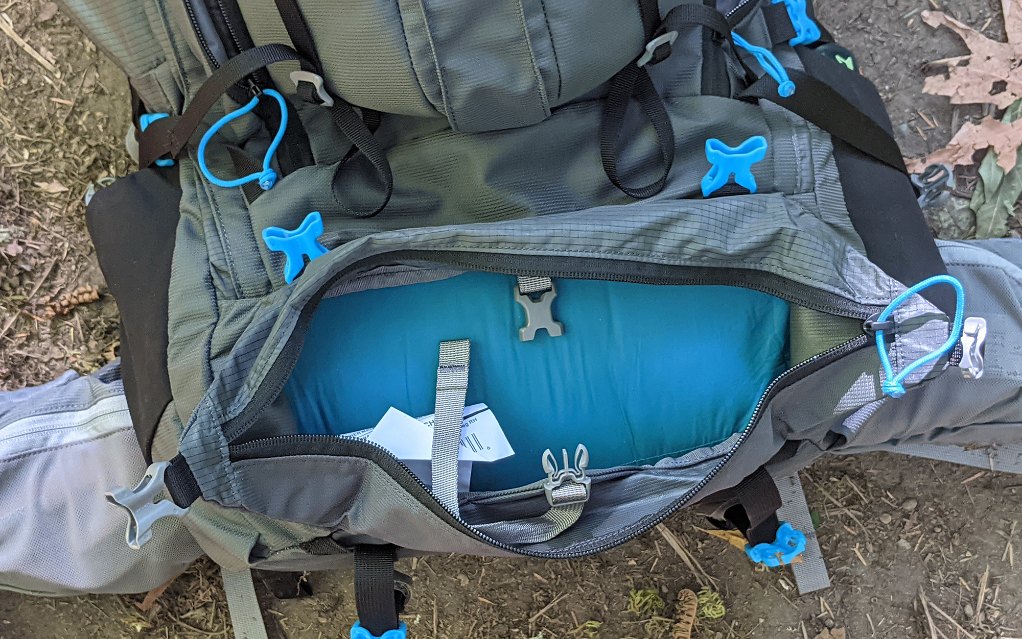 The sleeping bag compartment just barely fit a 30-degree Kelty Cosmic Down sleeping bag.