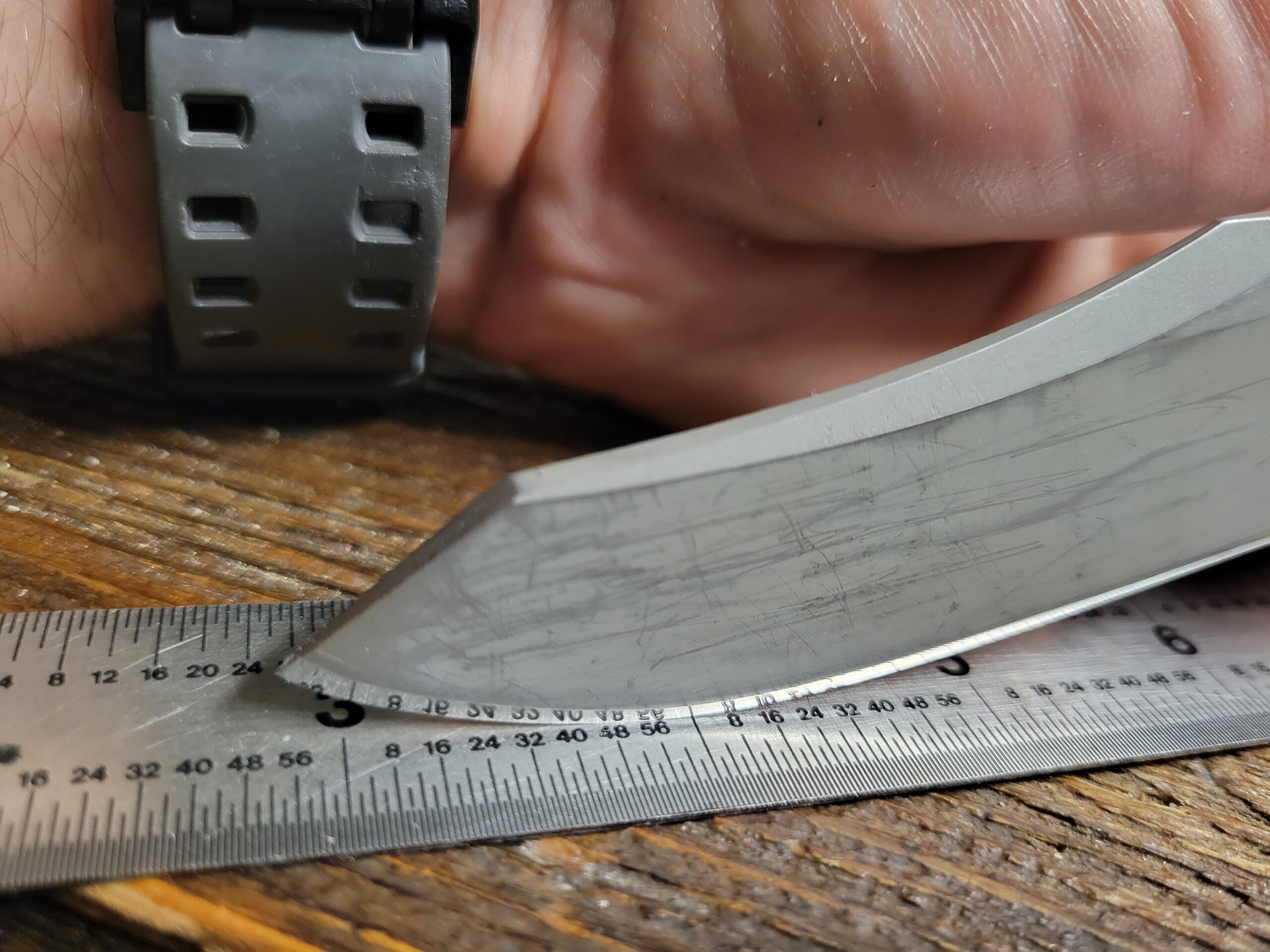 The finished edge of a sharpened pocket knife