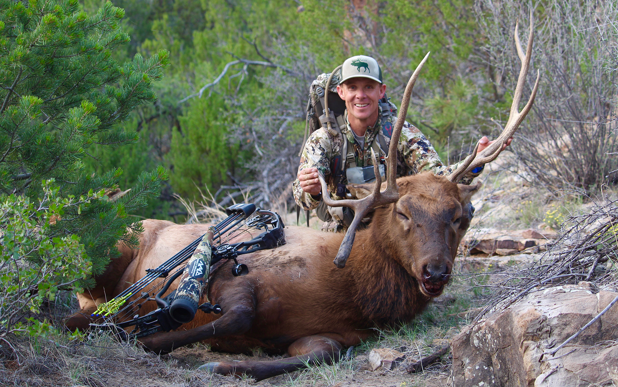 Hunter poses with tagged elk.