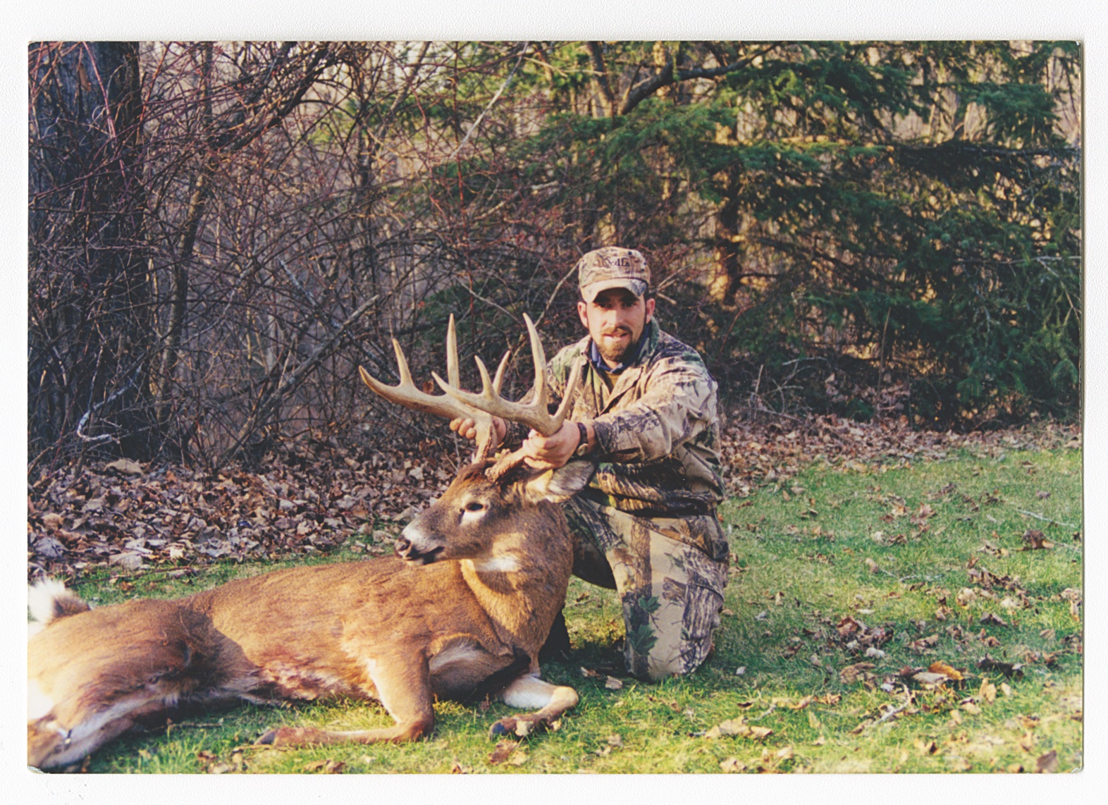 A hunter with a nice New England buck.